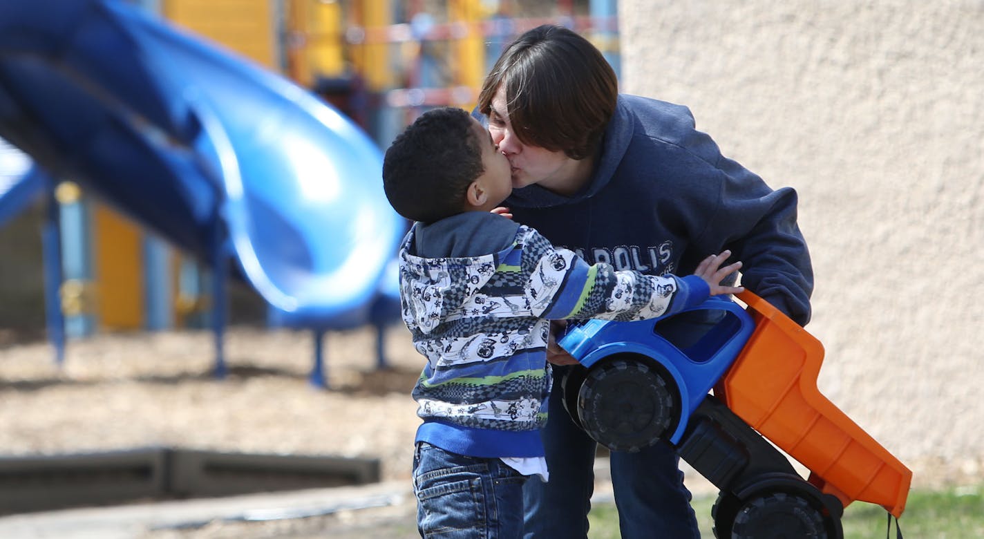 Michaella Waters prepared her five-year-old son, Jordan, who is autistic, for school Thursday, April 23, 2015, outside their apartment building in St. Louis Park, MN. Finally eligible for section 8 housing, the single mother has made more than 50 calls a week to landlords, in her quest to find a rental unit in the suburbs that accepts Section 8, a federal housing voucher. Waters has been on a wait list for the voucher for more than seven years. Waters says she has done all the right things to be