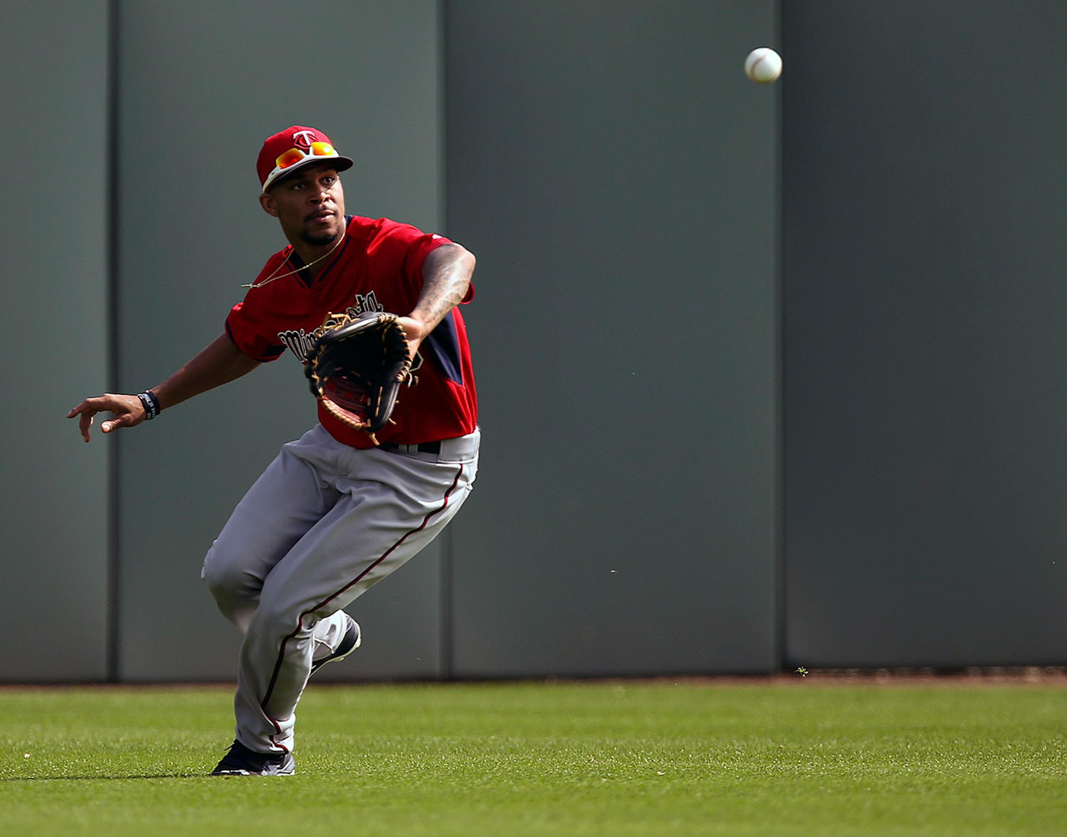 Minnesota Twins center fielder Byron Buxton sprinted for a ball during a fielding drill for outfielders Saturday morning at Hammond Stadium.