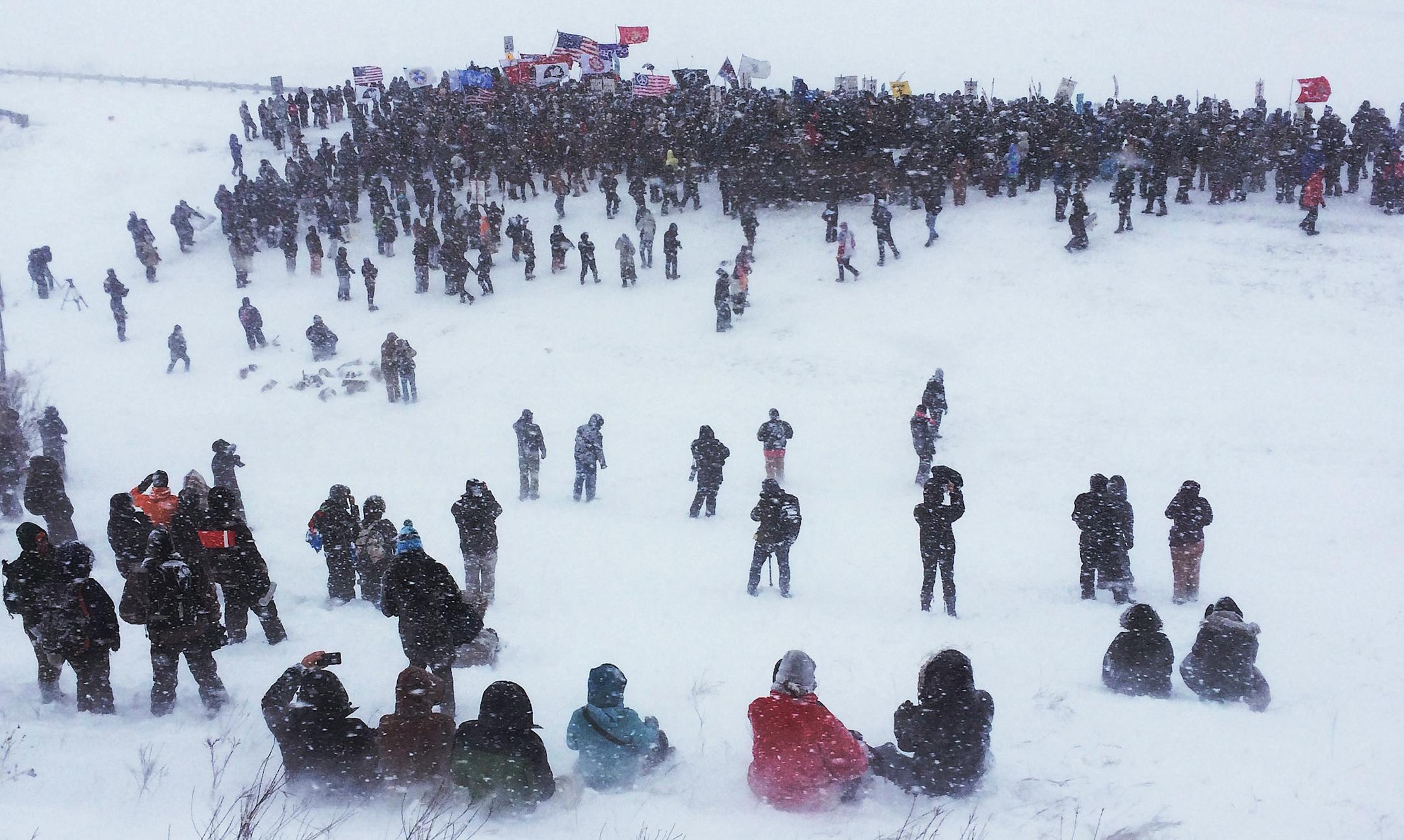 Veterans marched to the blockaded bridge which leads to the construction site for DAPL.