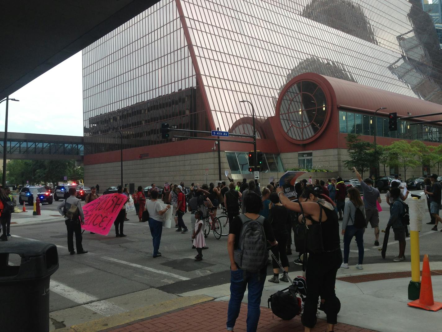 The protesters were standing in a downtown Minneapolis intersection on Friday night.