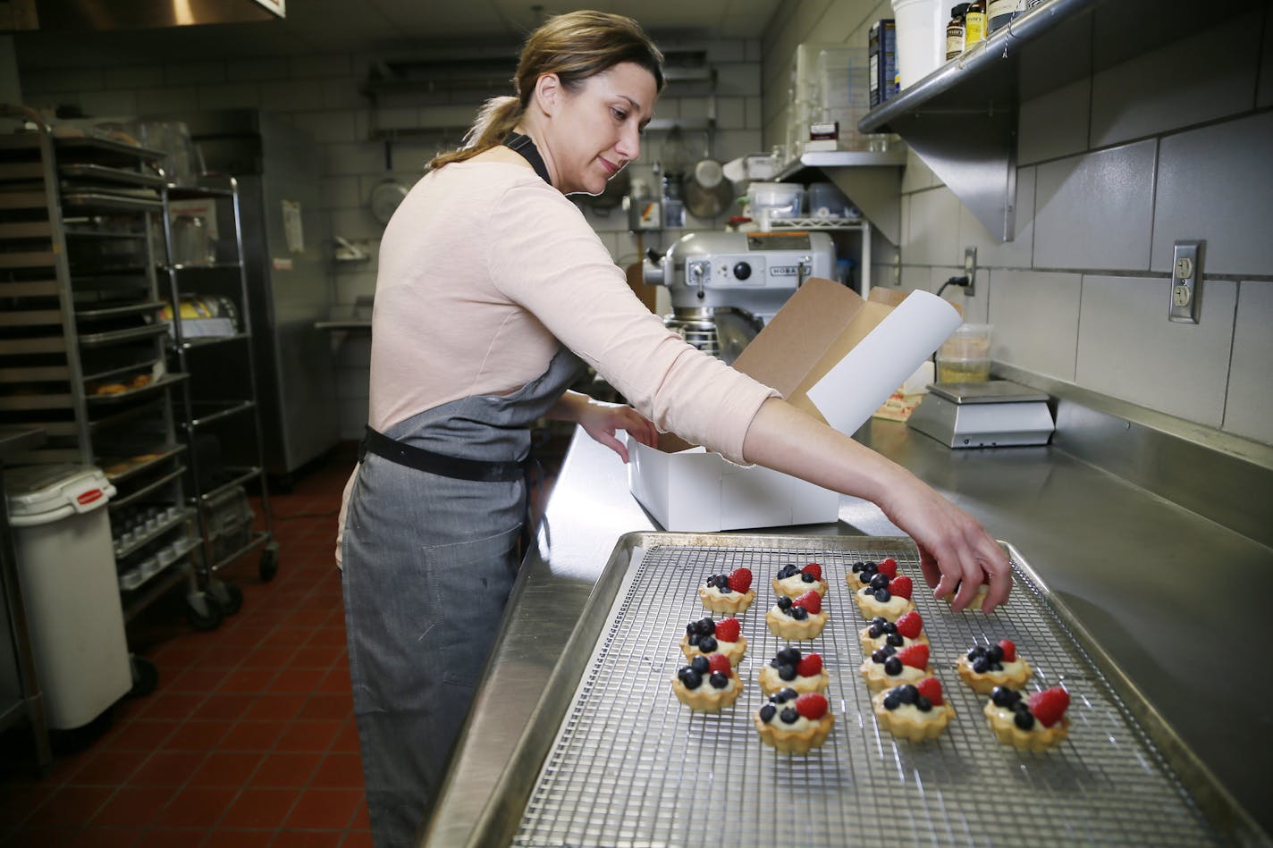 Tracy Kohler owner of Farina Bakeshop spent Wednesday morning preparing baking goods for clients January 7, 2015 Excelsior ,MN. ] Jerry Holt/ Jerry.Holt@Startribune.com