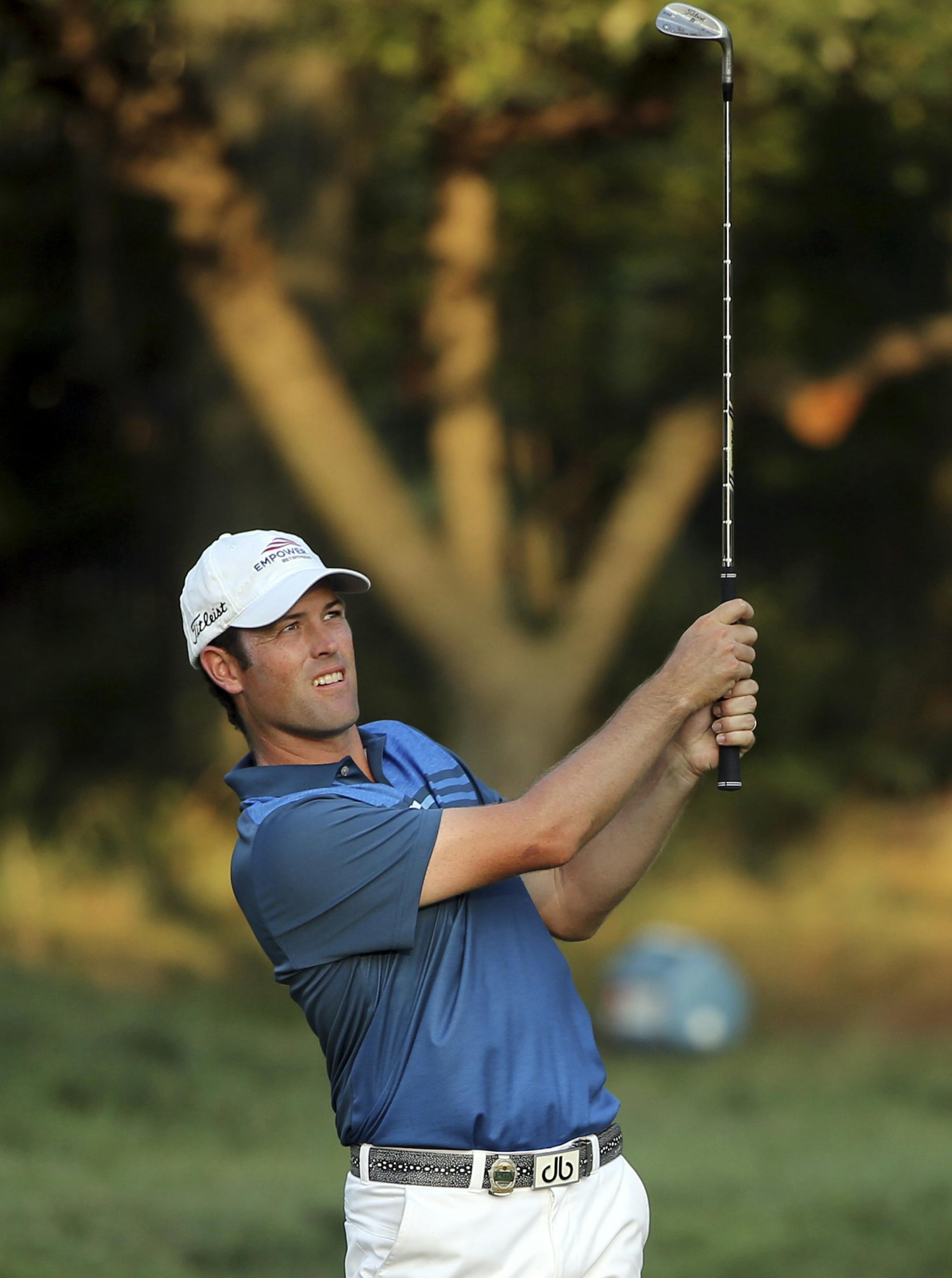 Robert Streb watches his approach shot on the eighth hole during the second round of the PGA Championship golf tournament at Baltusrol Golf Club in Springfield, N.J., Friday, July 29, 2016. (AP Photo/Seth Wenig)