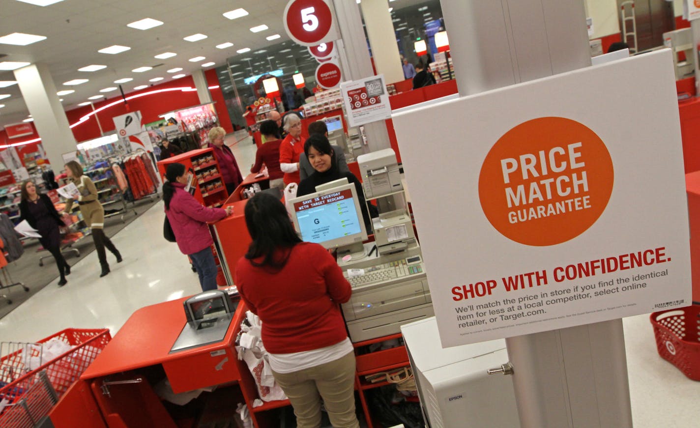 Target has posted its year-round price match policy at locations around the downtown Minneapolis store.