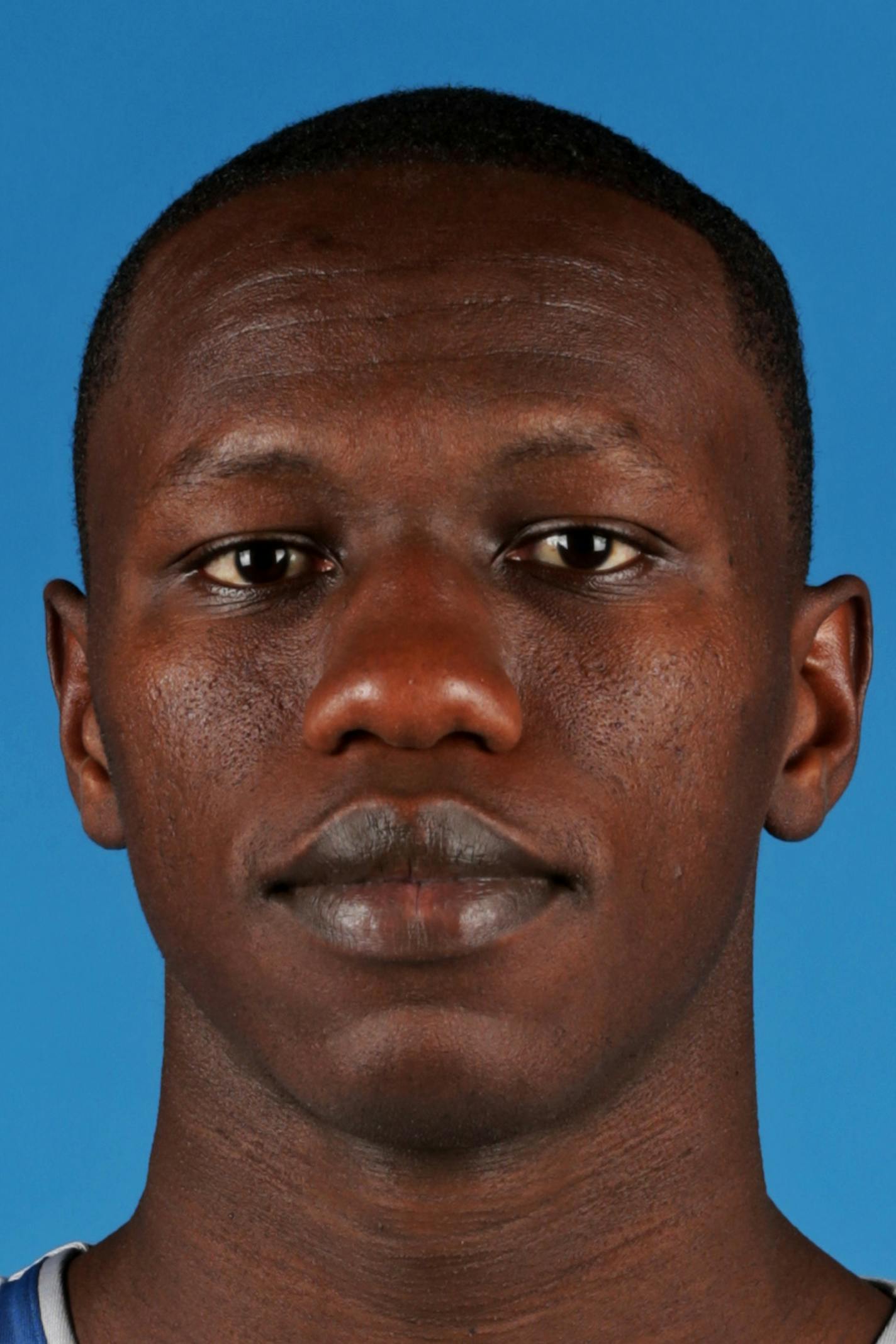 Minnesota Timberwolves' Gorgui Dieng poses for media day photos Monday, Sept. 29, 2014, in Minneapolis. (AP Photo/Jim Mone) ORG XMIT: MP10