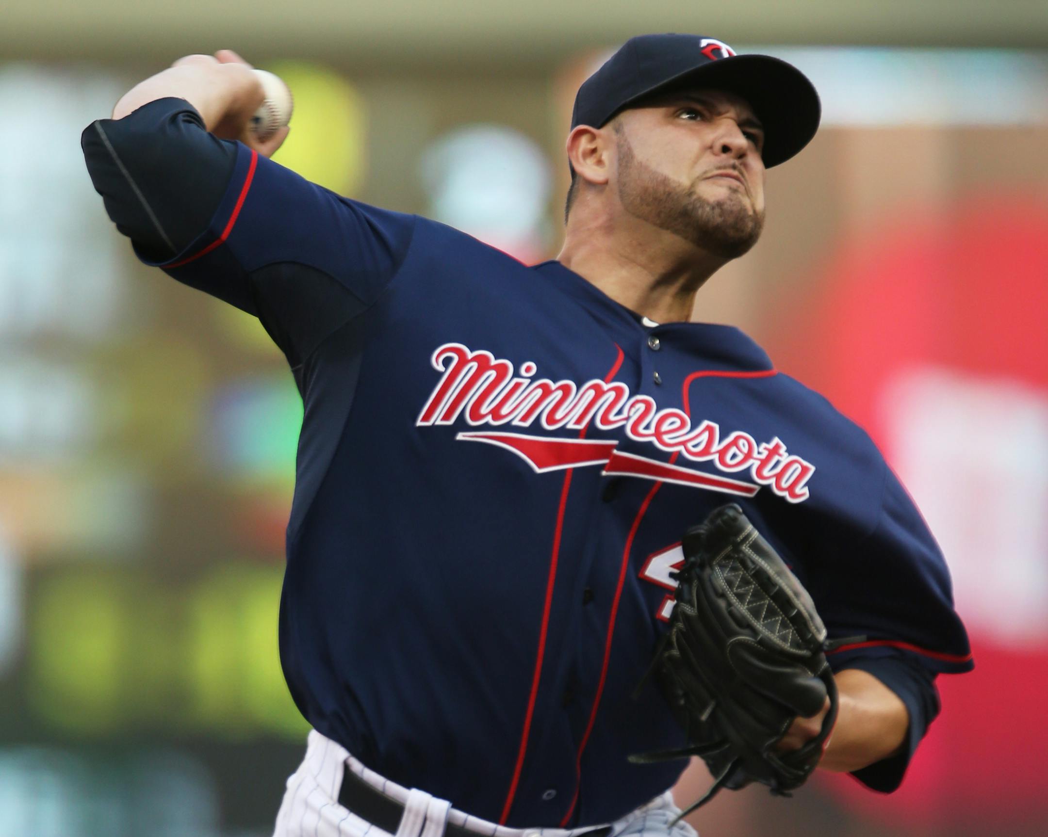Minnesota Twins pitcher Ricky Nolasco throws against the Kansas City Royals in the first inning of a baseball game, Friday, Aug. 15, 2014 , in Minneapolis. (AP Photo/Jim Mone)