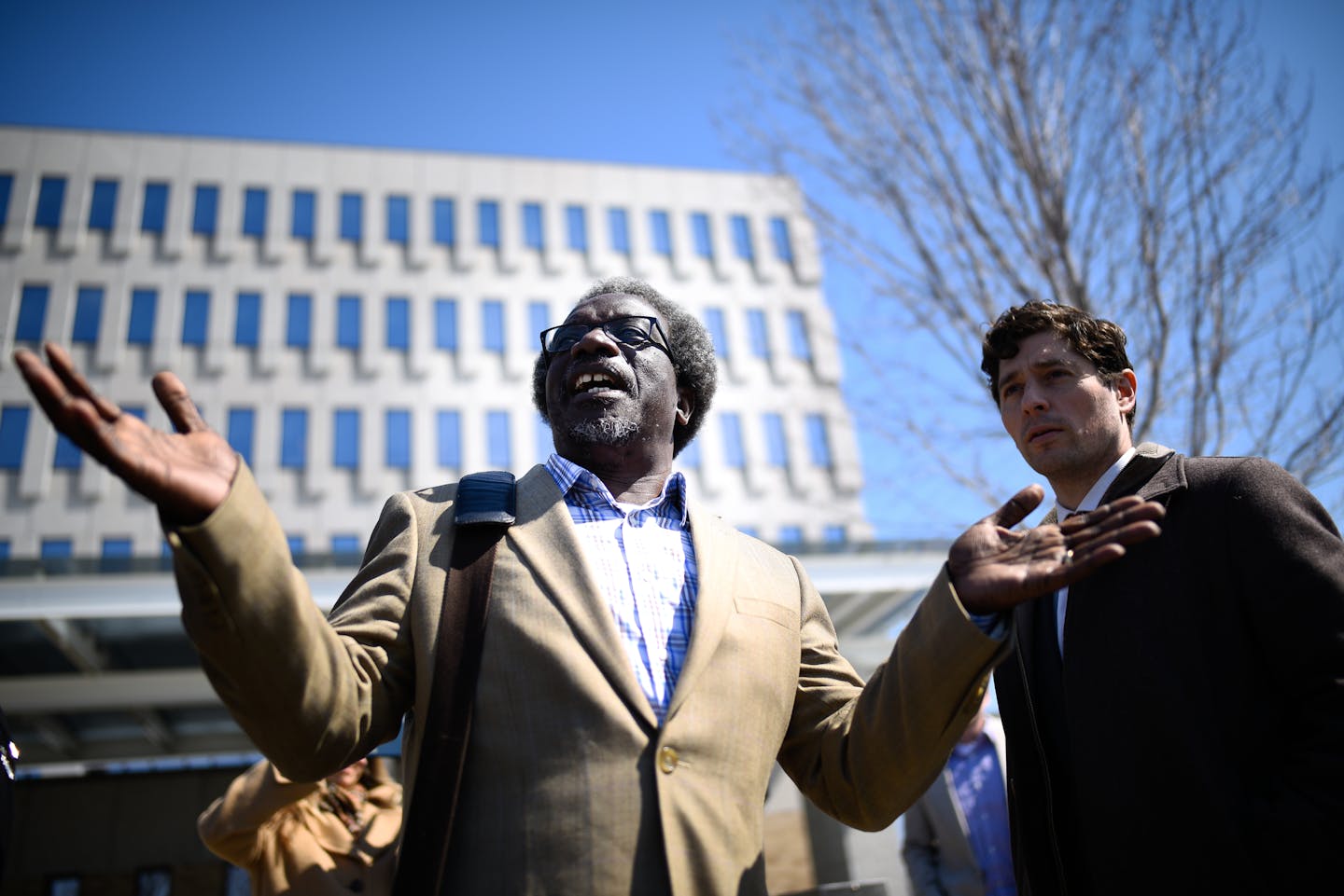 Augsburg Professor Mzenga Wanyama stood beside Minneapolis Mayor Jacob Frey as Wanyama addressed supporters who were demonstrating outside the Immigration and Customs Enforcement headquarters Thursday on his behalf Thursday. ] AARON LAVINSKY &#xef; aaron.lavinsky@startribune.com Augsburg Professor Mzenga Wanyama and his wife Mary returned to Immigration and Customs Enforcement headquarters Thursday, April 5, 2018 for another check-in to discuss the agency's plan to deport them. Wanyama emerged t