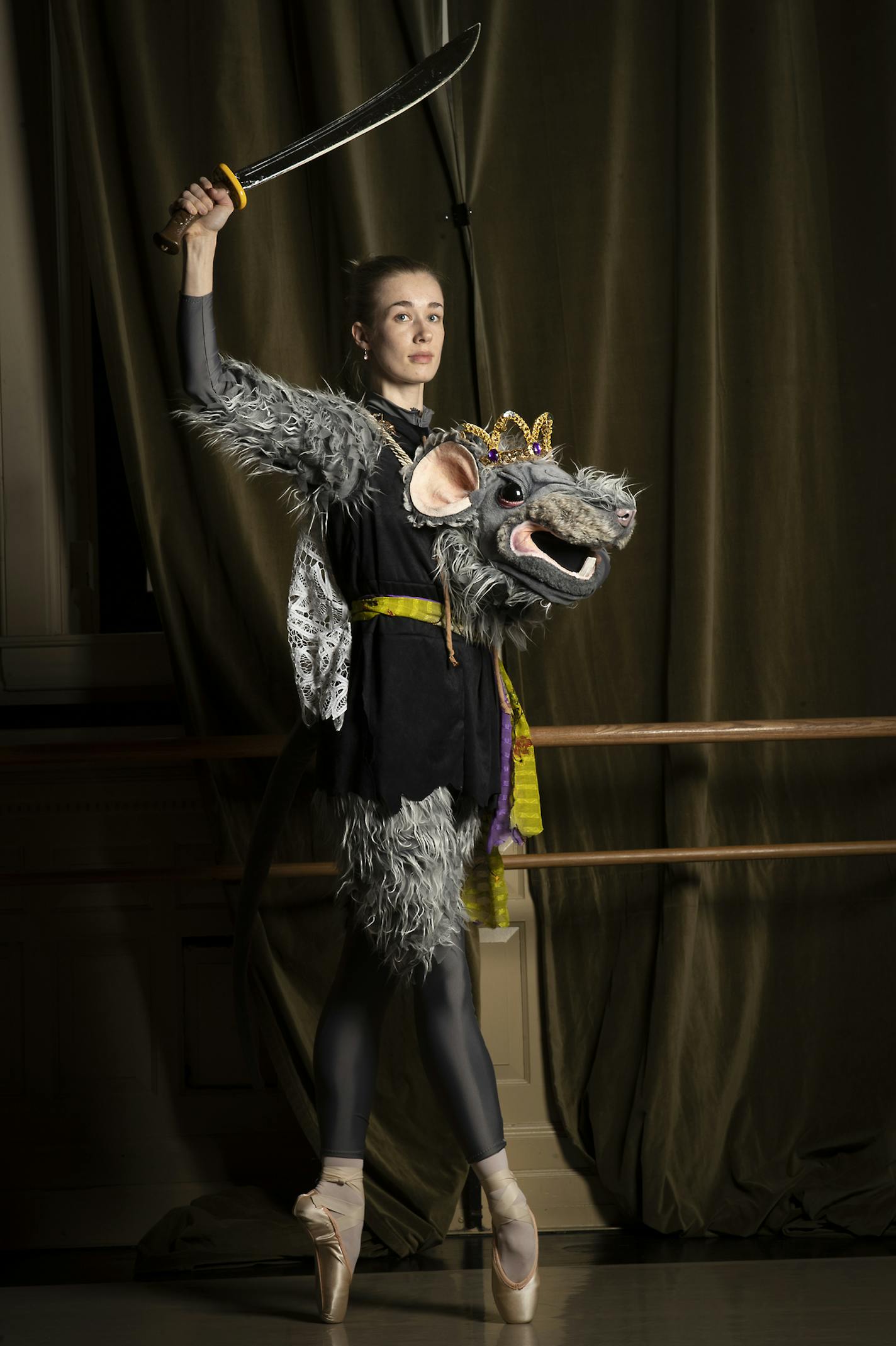 Emily Kleinschmidt wears a giant mask as the Mouse Queen in Twin Cities Ballet's "A Minnesota Nutcracker."