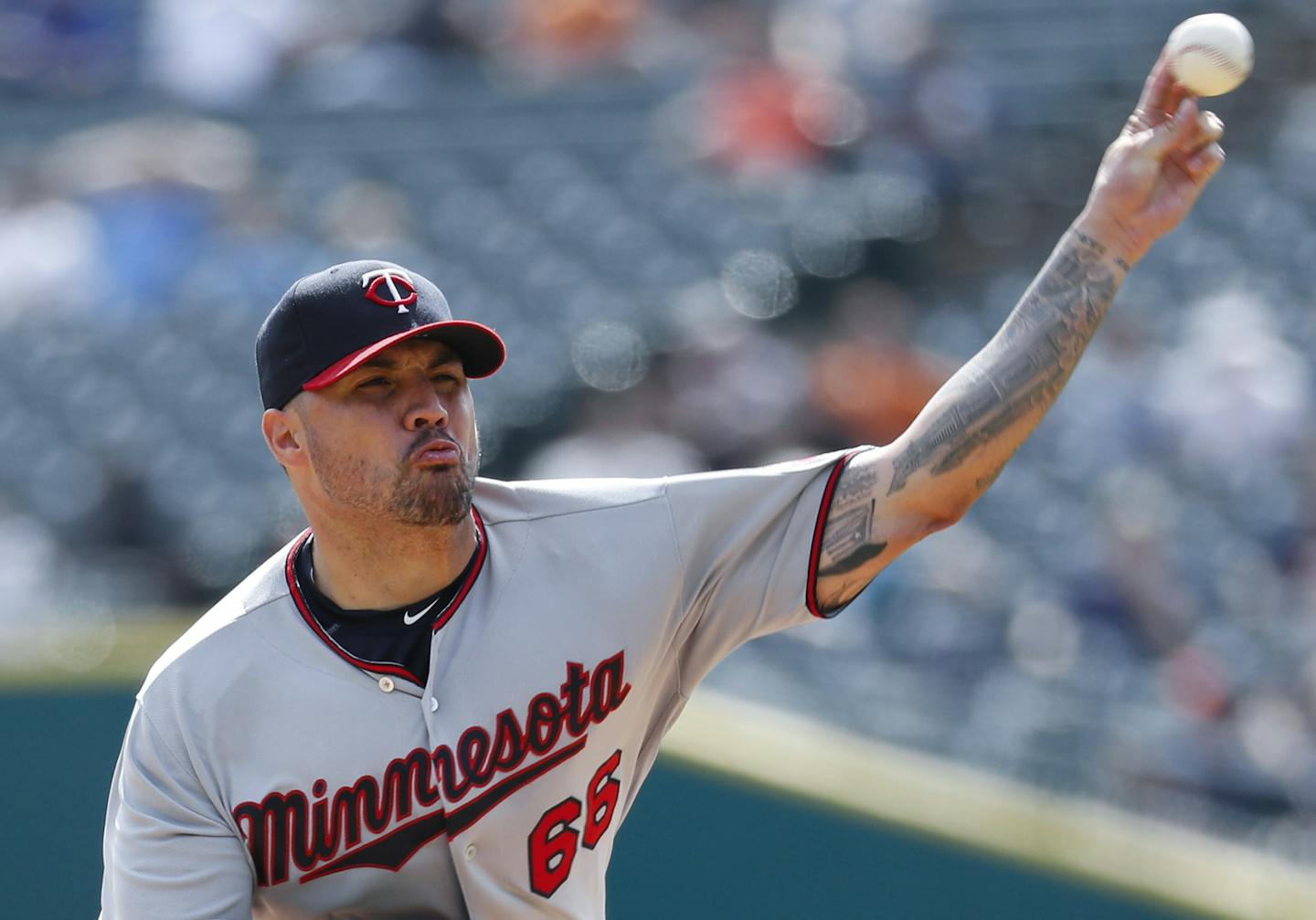 Minnesota Twins pitcher Hector Santiago throws against the Detroit Tigers in the first inning of a baseball game in Detroit, Thursday, Sept. 15, 2016. (AP Photo/Paul Sancya)