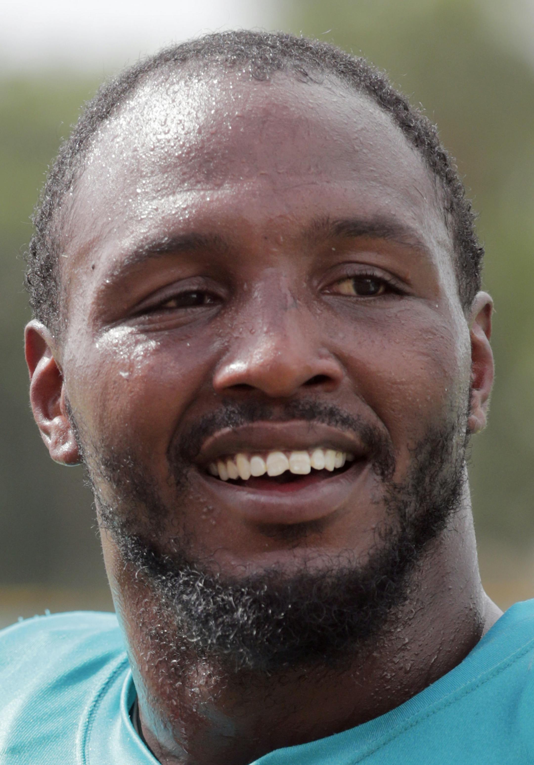 Miami Dolphins defensive end Robert Quinn walks off the field at the NFL football team's training camp, Wednesday, Aug. 1, 2018, in Davie, Fla. (AP Photo/Lynne Sladky) ORG XMIT: OTK