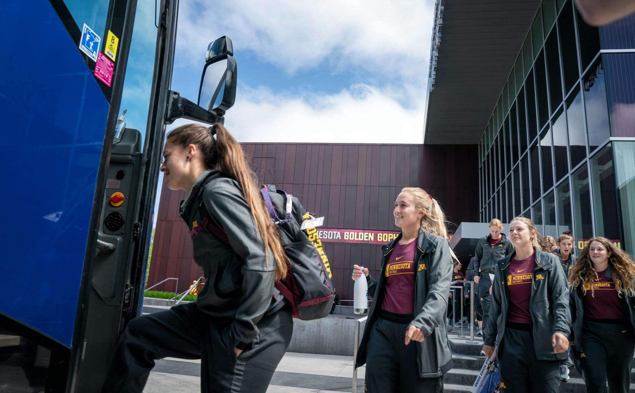 The Gophers softball team boarded team busses and headed to Oklahoma City for the Women's College World Series.