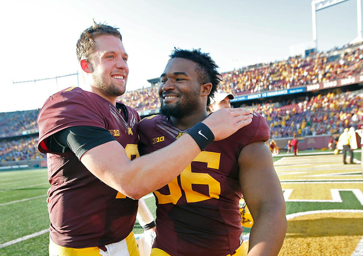 Minnesota's quarterback Mitch Leidner, left, and defensive tackle Steven Richardson celebrated their 27-24 victory over Ohio at TCF Bank Stadium, Saturday, September 26, 2015 in Minneapolis, MN.