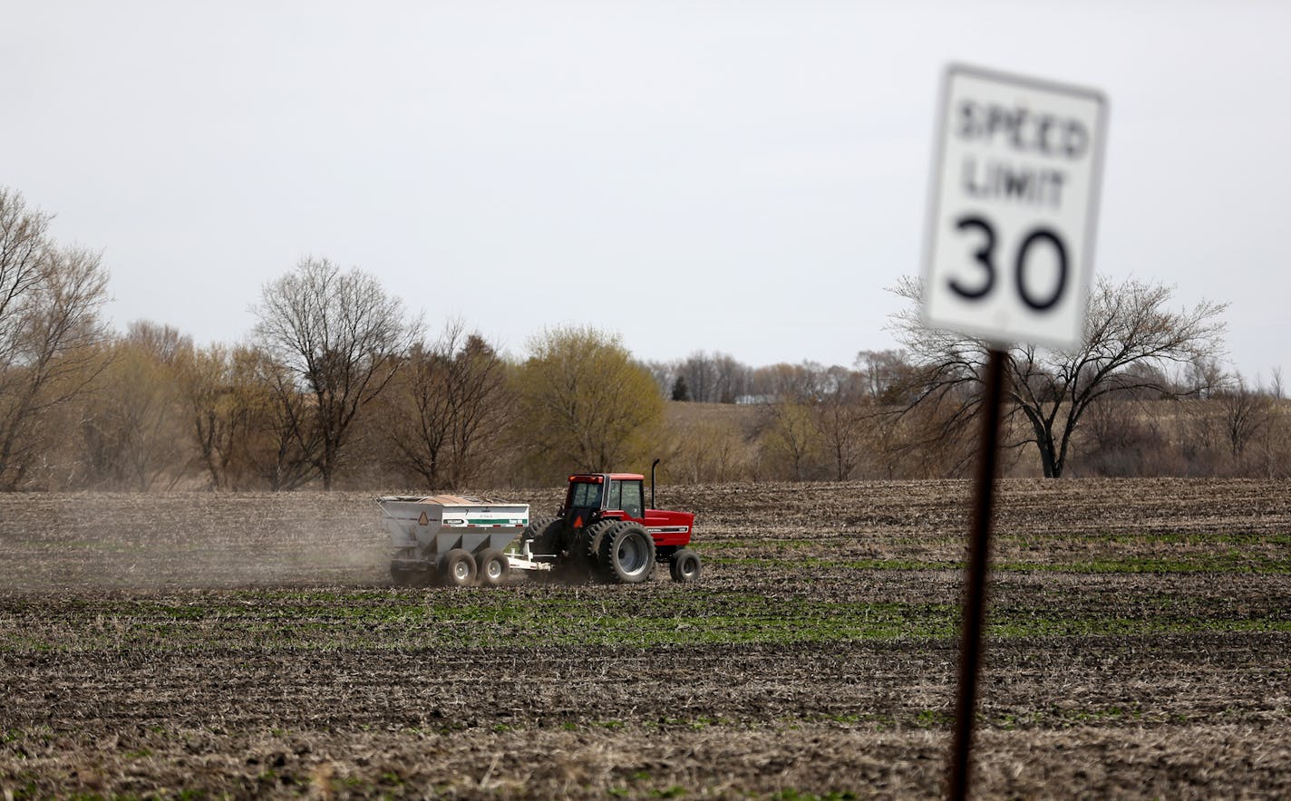 A farmer worked the earth off of Highway 13 in Lydia.