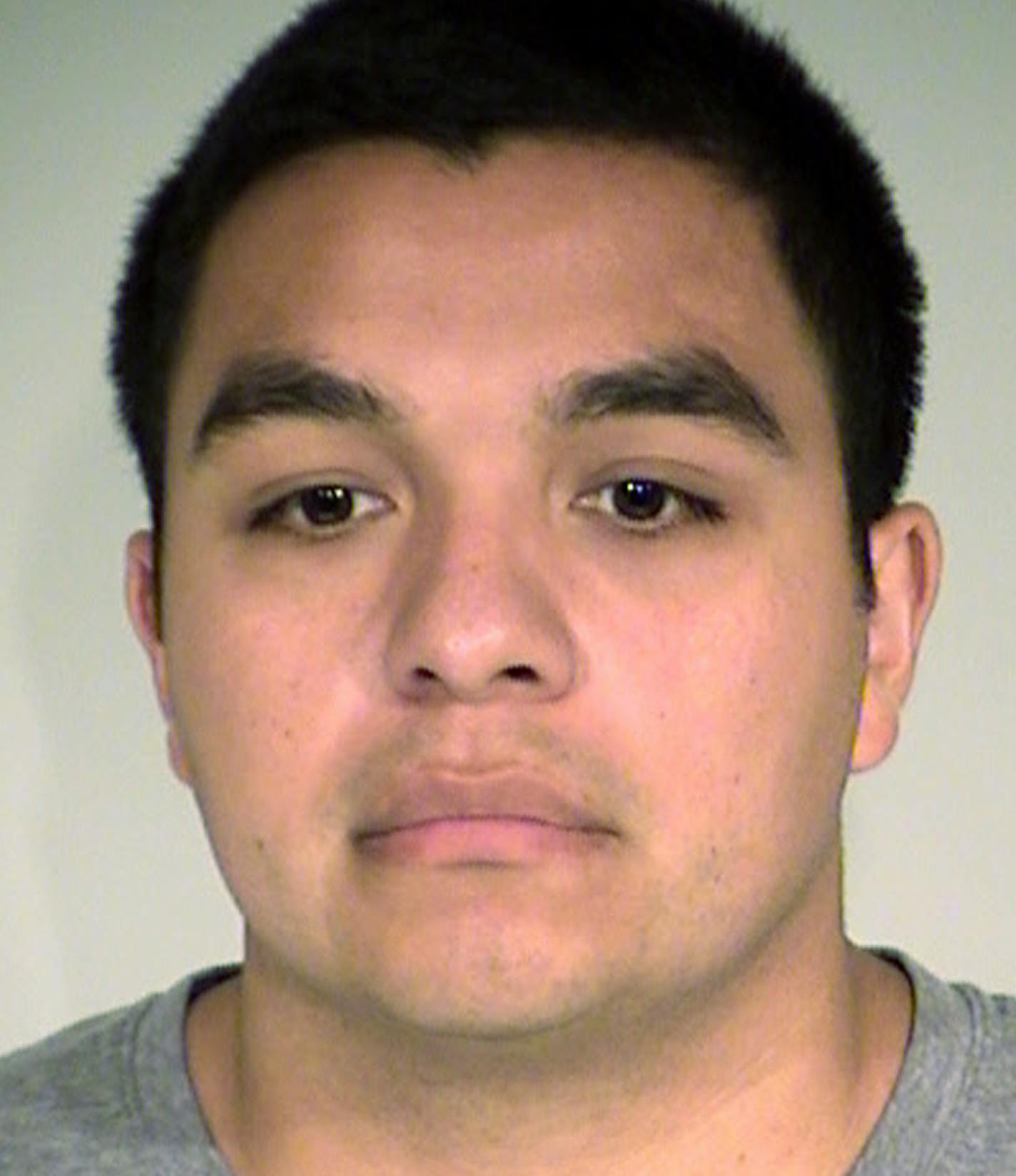 FILE - This Nov. 17, 2016, file photo provided by the Ramsey County Sheriff's Office shows Jeronimo Yanez. Attorneys for Yanez, a Minnesota police officer accused of fatally shooting a black man during a traffic stop say Philando Castile's gun was accessible and that he was reaching for it when he was killed. A memo filed Tuesday, Feb. 7, 2017, in Ramsey County District Court contradicts prosecutors' claims that St. Anthony Officer Yanez didn't see the weapon and made conflicting statements abou