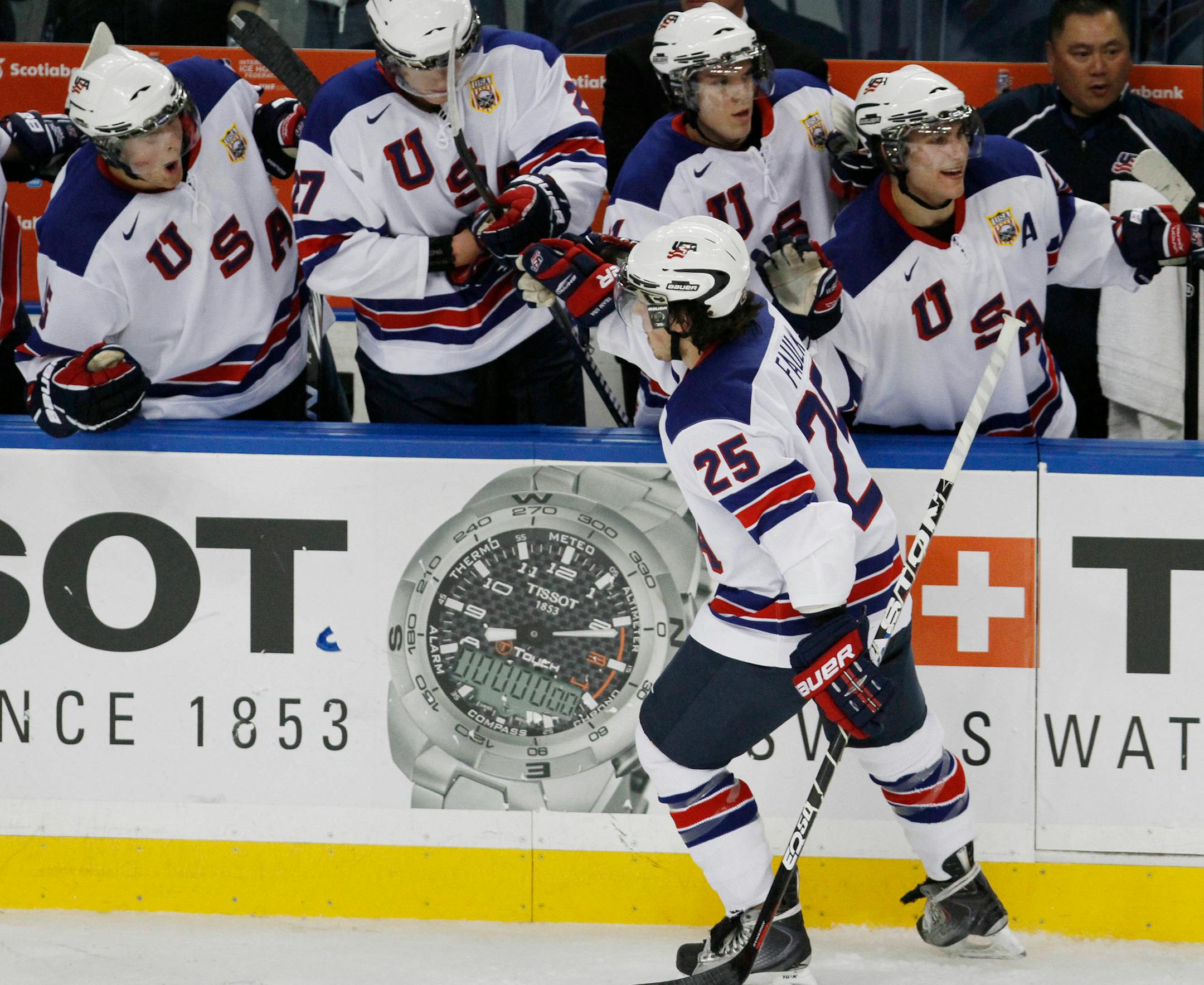 South St. Paul's Justin Faulk celebrated his goal with his teammates during the first period of Sunday's Team USA-Finland game in Buffalo, N.Y.