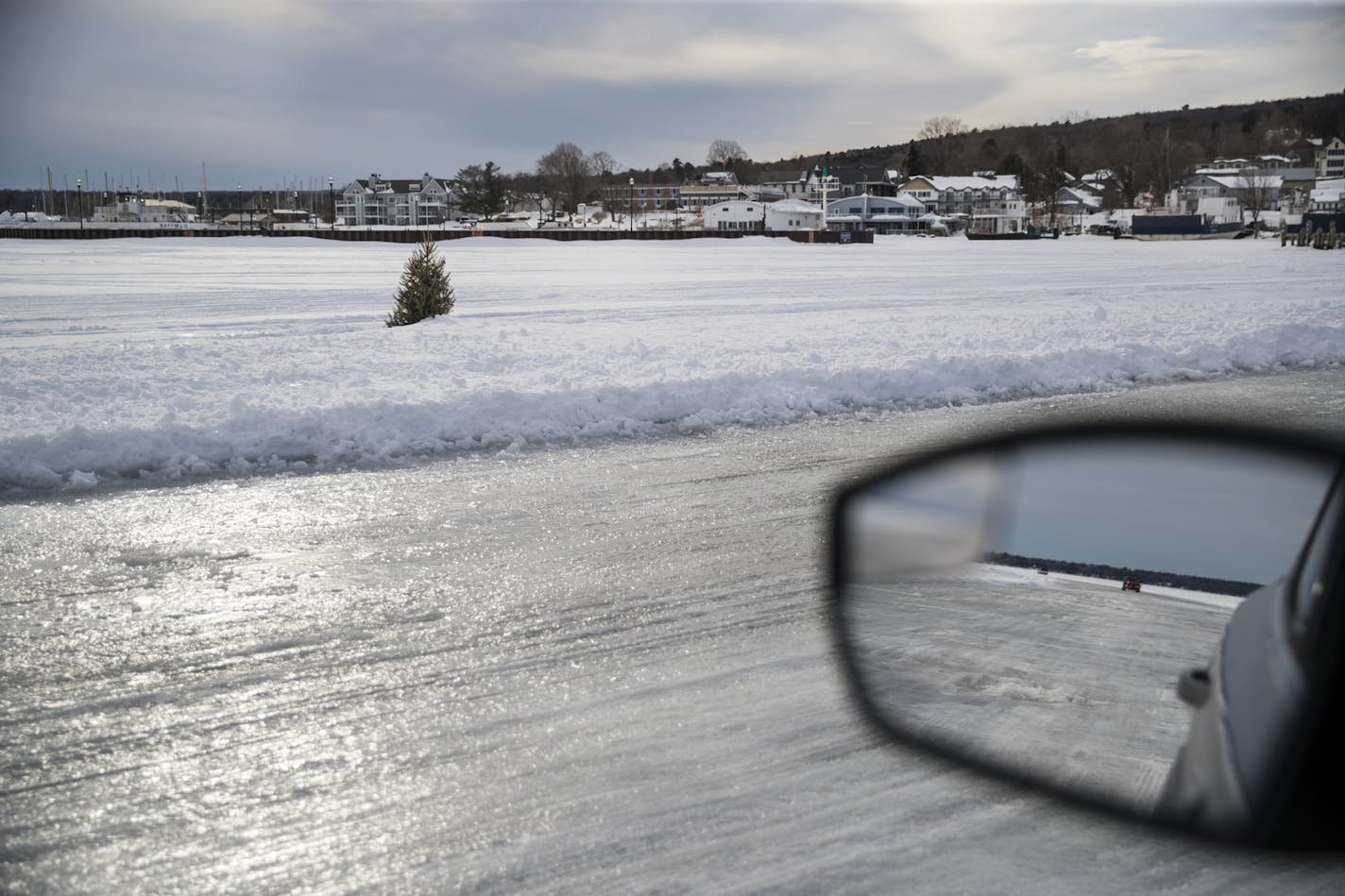 Driving across the ice road from La Pointe on Madeline Island to Bayfield there are trees leading the way to help keep you on the road in bad weather. Photographed on Monday, March 5, 2018. ] RENEE JONES SCHNEIDER &#x2022; renee.jones@startribune.com