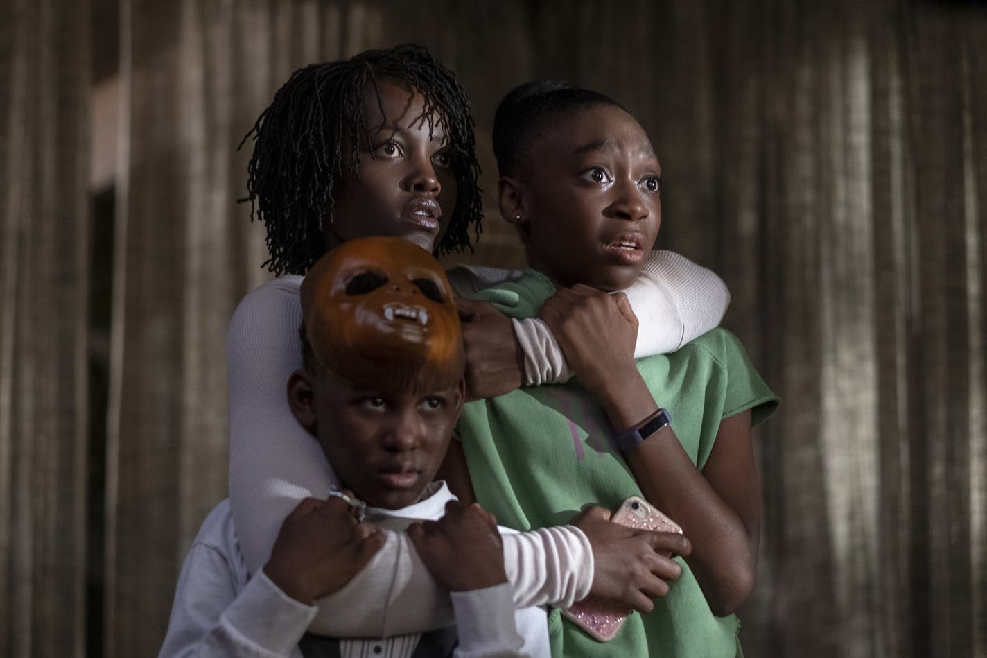 (clockwise from left) Jason Wilson (Evan Alex), Adelaide Wilson (Lupita Nyong&#x2019;o) and Zora Wilson (Shahadi Wright Joseph) in "Us," written, produced and directed by Jordan Peele.