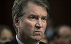Supreme Court nominee Brett Kavanaugh listens to complaints from Democrats about not having enough time to prepare.