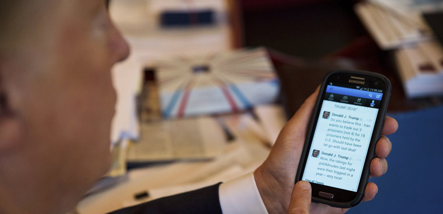 Donald Trump demonstrates his tweeting skills in his office at Trump Tower in New York, Sept. 29, 2015. Some say it took Trump&#xed;s unfiltered, type-anything style to fulfill what digital strategists have long predicted: a campaign built on social media. (Josh Haner/The New York Times) ORG XMIT: MIN2016112817402464