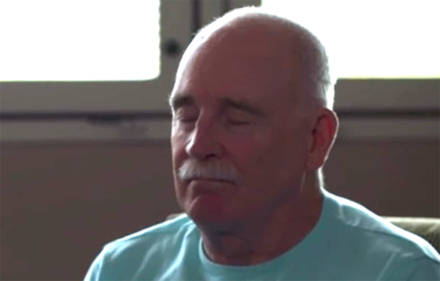 A Minnesota veteran meditates during a session for mindfulness-based stress reduction therapy.