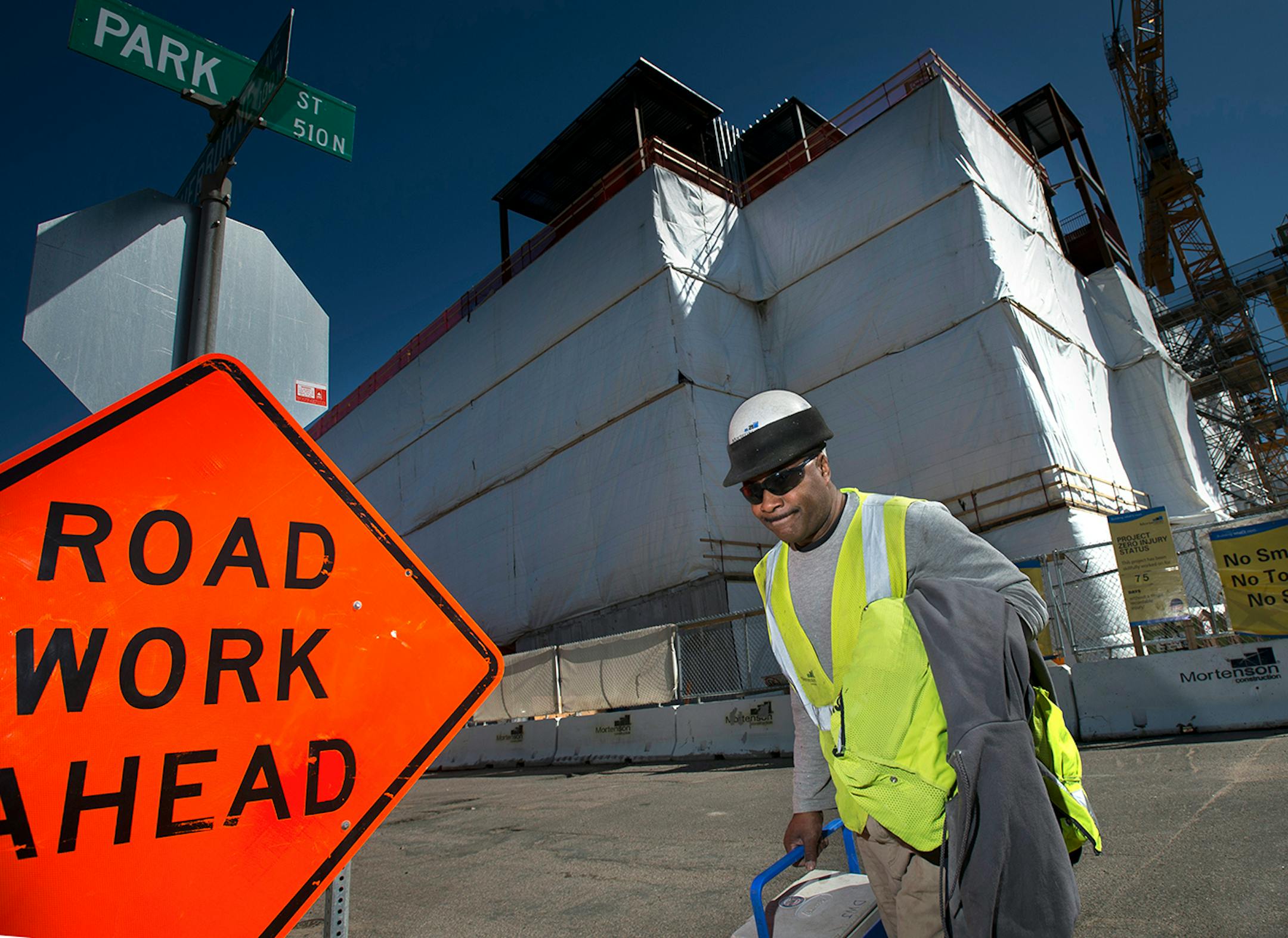 Carpenter David Jackson leaves the Senate Office Building construction site on Tuesday afternoon at the end of his work day.
