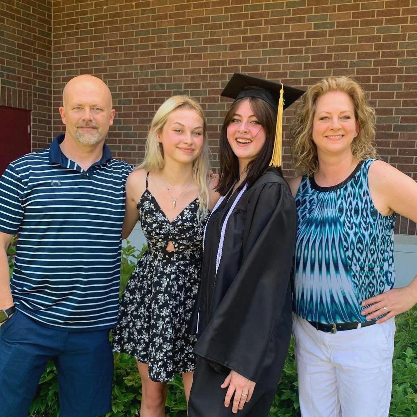 Shawn Filiowich (far left) near his daughters (center left, center right) and wife Rochelle Filiowich (far right). Shawn died from a months-long battle with pancreatic cancer after serving as a St. Paul officer for decades.