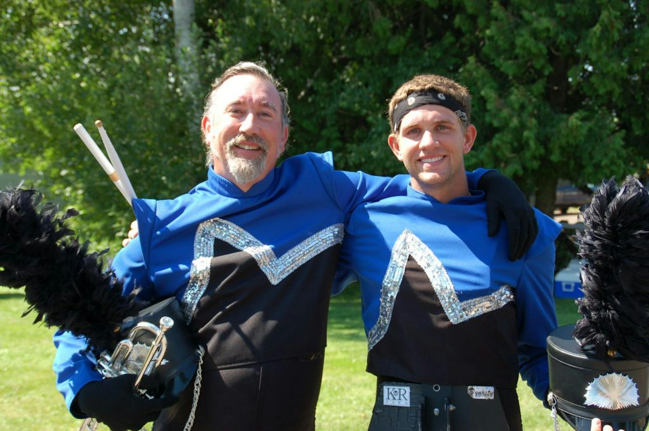 Trumpet player Tom Jones and his son Dan, a snare drummer, perform together in the world champion Minnesota Brass.