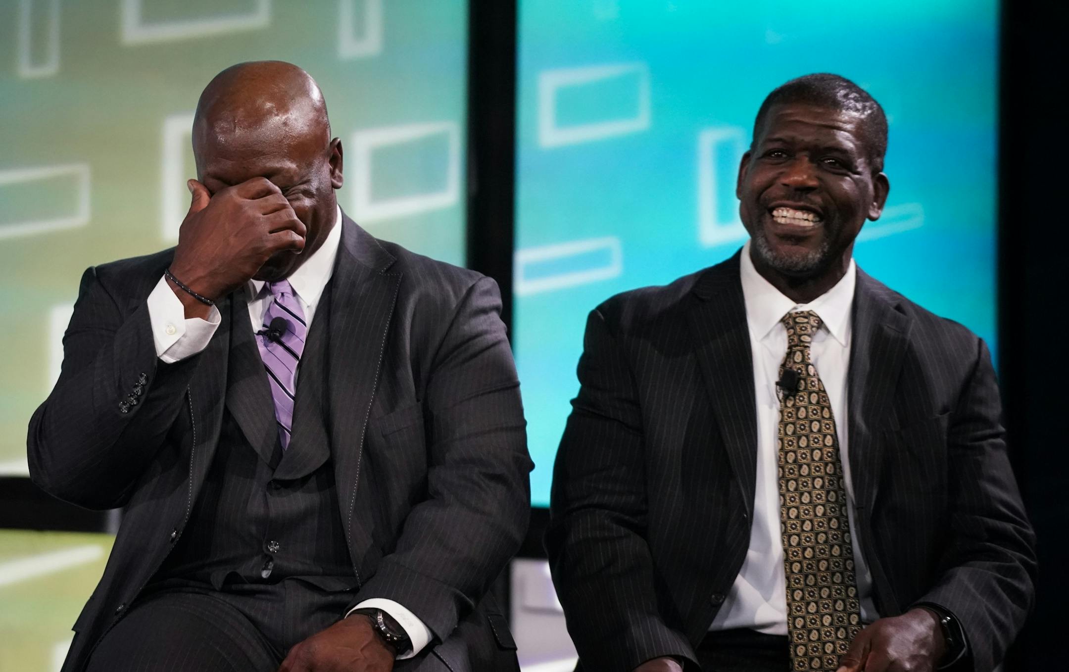 Vikings greats John Randle (left) and Randall McDaniel cracked up as Lindsay Whalen spoke during her induction into the Star Tribune Sports Hall of Fame.