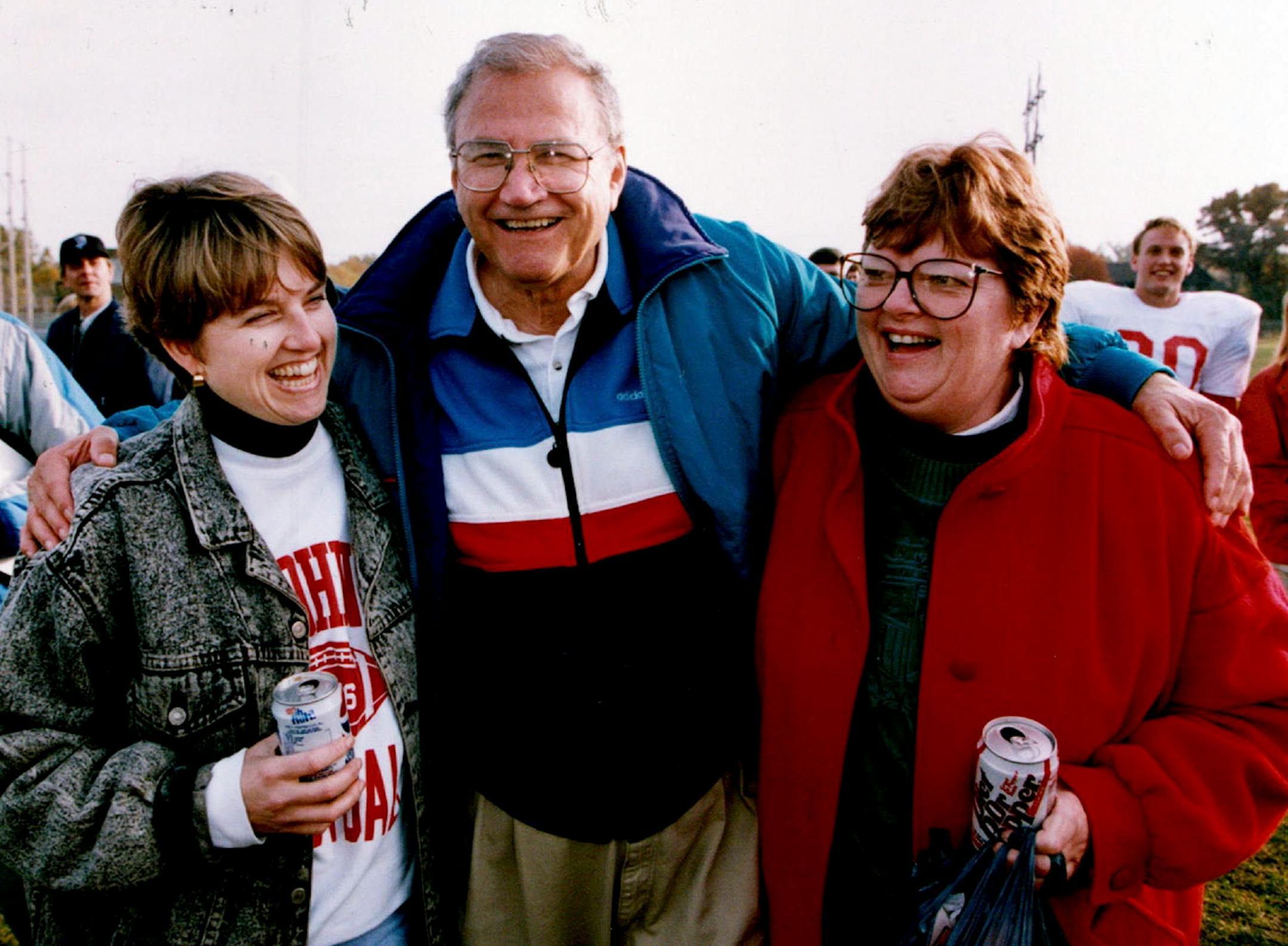 John Gagliardi celebrated his 300th career football victory with daughter Nancy Little, left, and wife Peggy in October of 1993.