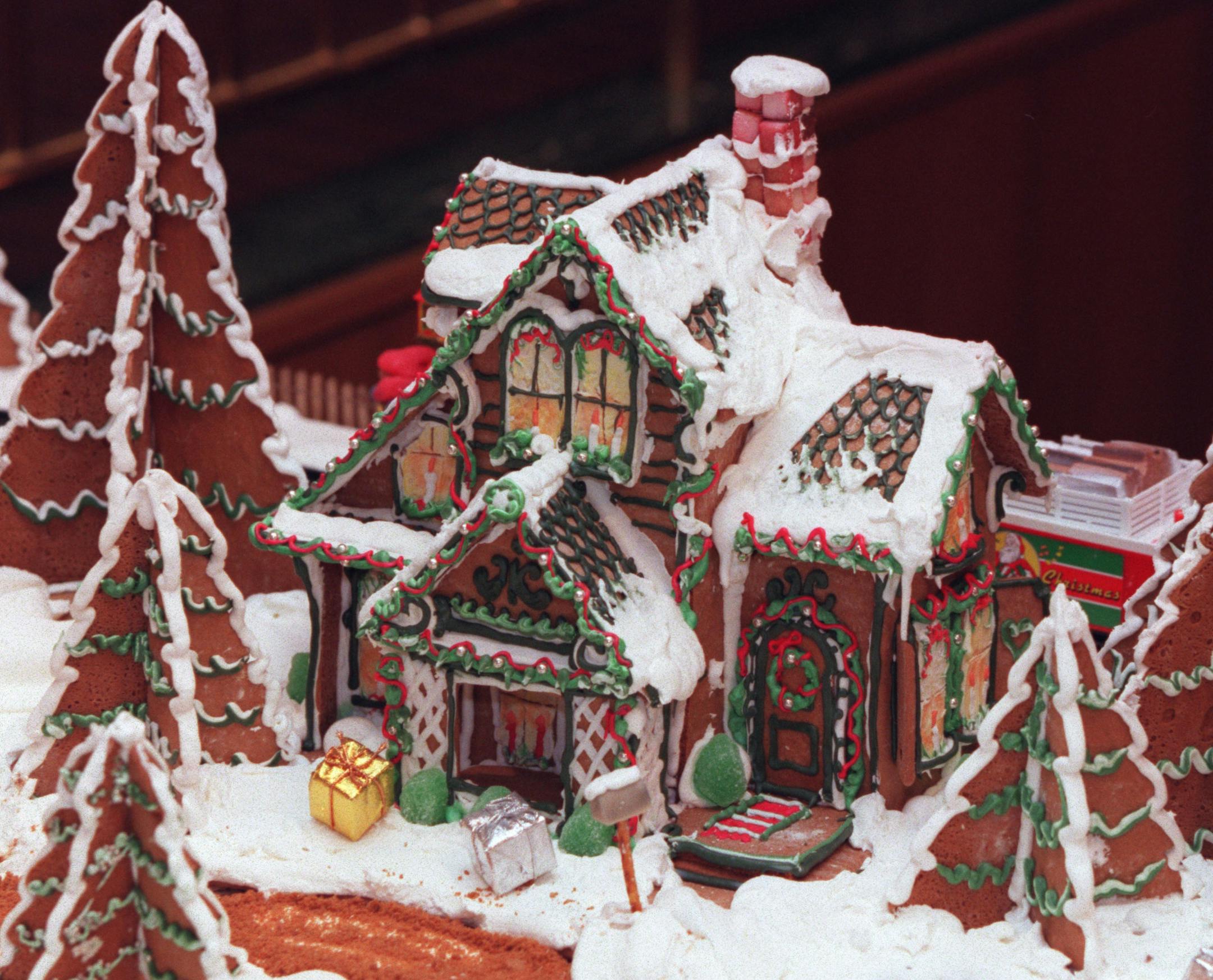 Detail of a six foot gingerbread village on display at the Double Tree Grand Hotel in Bloomington. The parts of the village were then taken to Children's Health Care West in Minnetonka for the pleasure of the children at the center. The village was constructed by Lavona Keskey, a baker from Wuollet's Bakery. The village took several hundred hours to complete and two days of labor to set-up at the Bloomington hotel. Construction used 913 eggs, 170 cups of flour, 472 cups of sugar, 10.5 pints of m