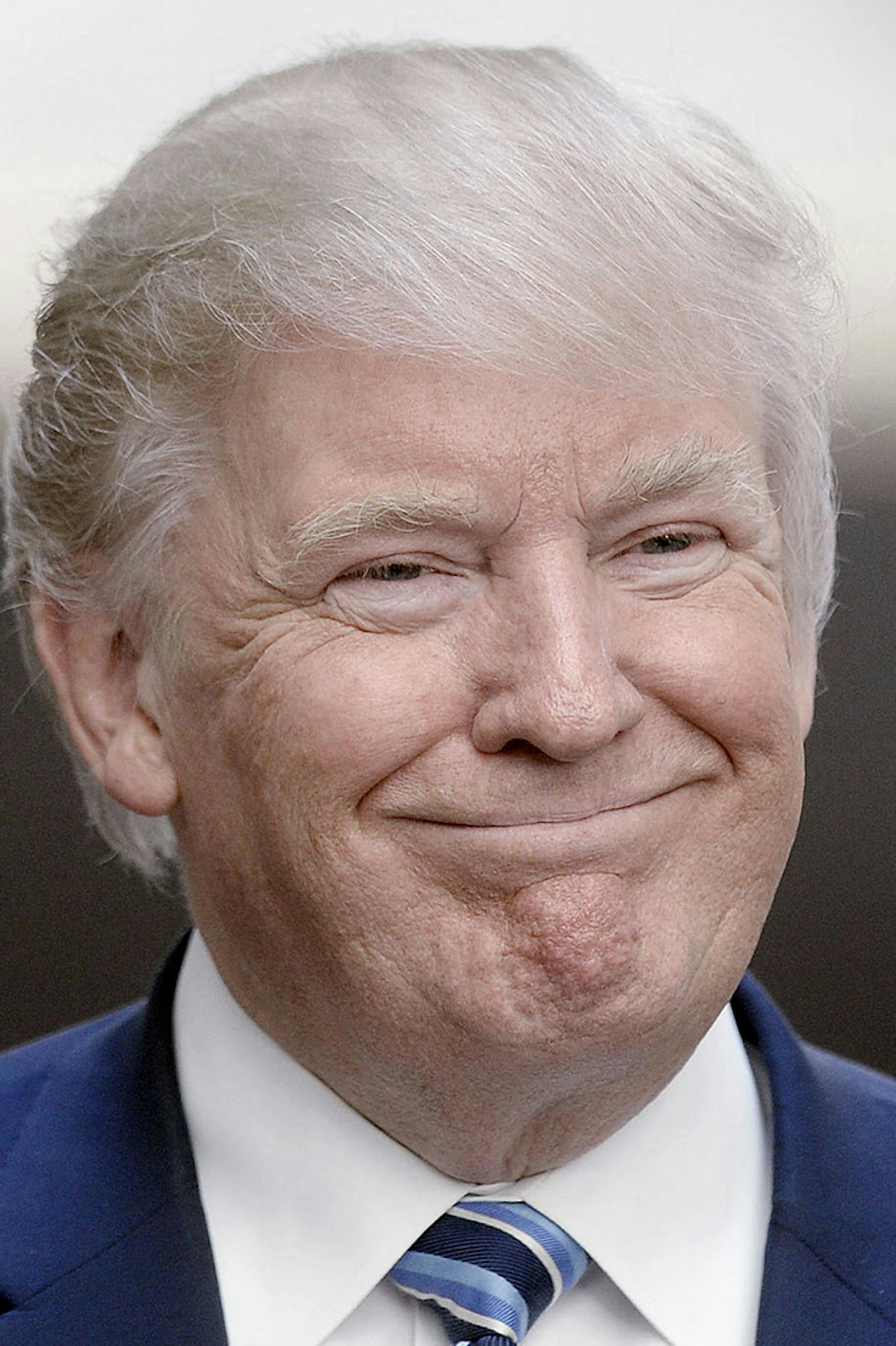 Republican presidential nominee Donald Trump looks on at the grand opening of the Trump International Hotel on October 26, 2016 in Washington, DC. (Olivier Douliery/Abaca Press/TNS) ORG XMIT: 1192246