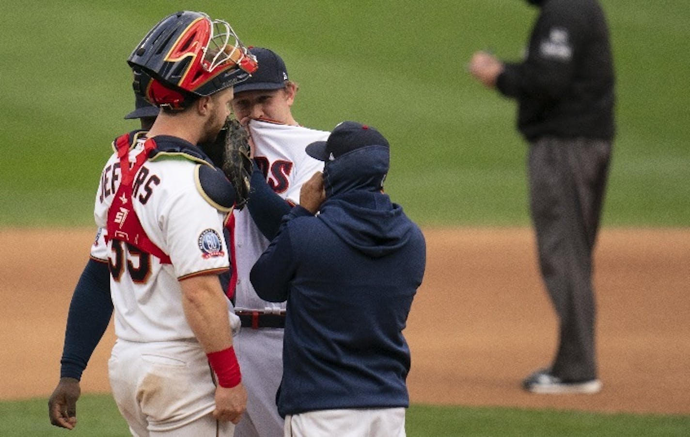 Twins reliever Tyler Duffey, catcher Ryan Jeffers and pitching coach Wes Johnson held a discussion on the mound in the seventh inning Tuesday.