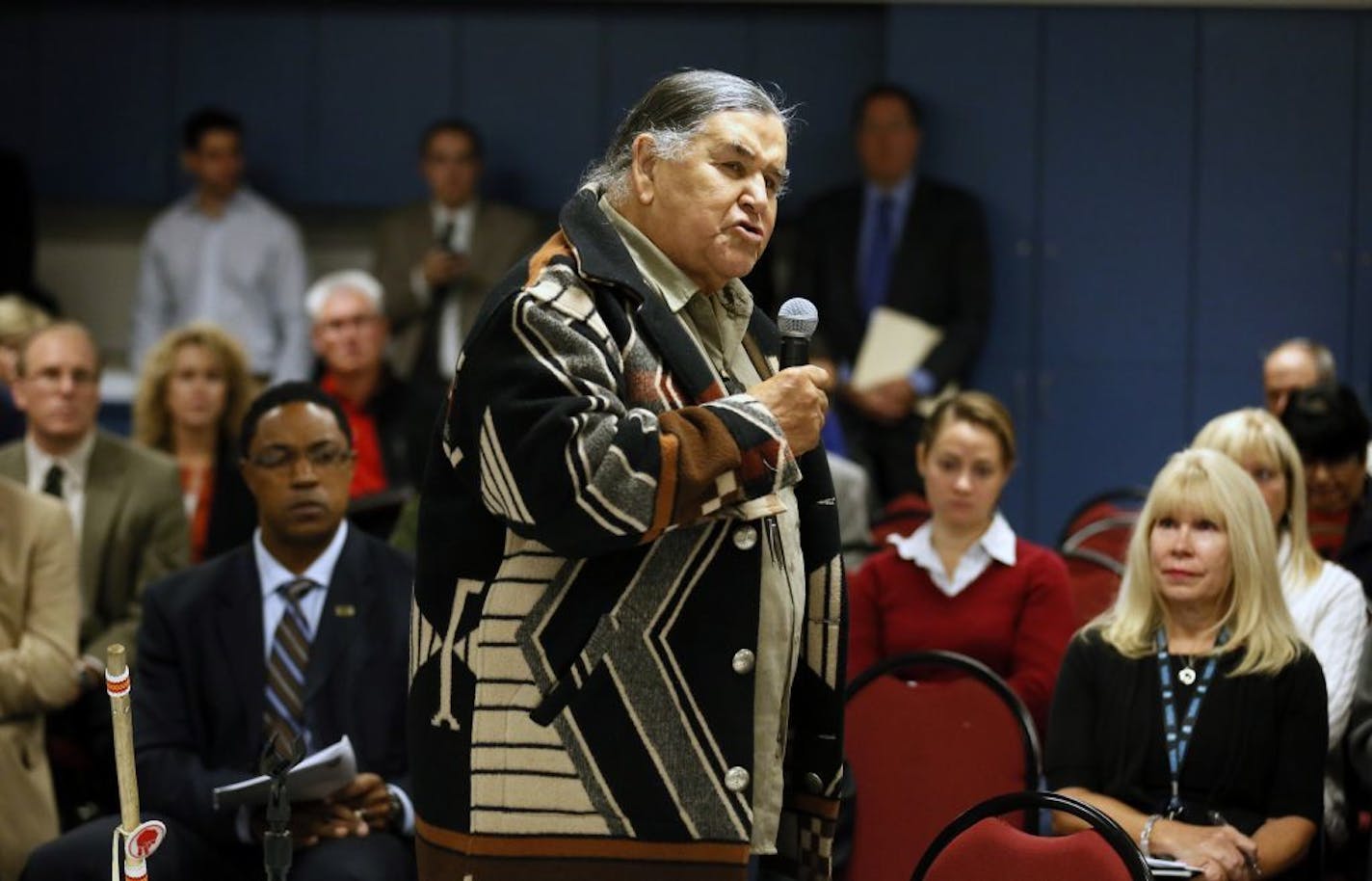 Clyde Bellecourt and several other representatives of the Minneapolis-based American Indian Movement attended the meeting and lobbied the board to ban the printing or broadcasting of the Redskins' nickname and logo.