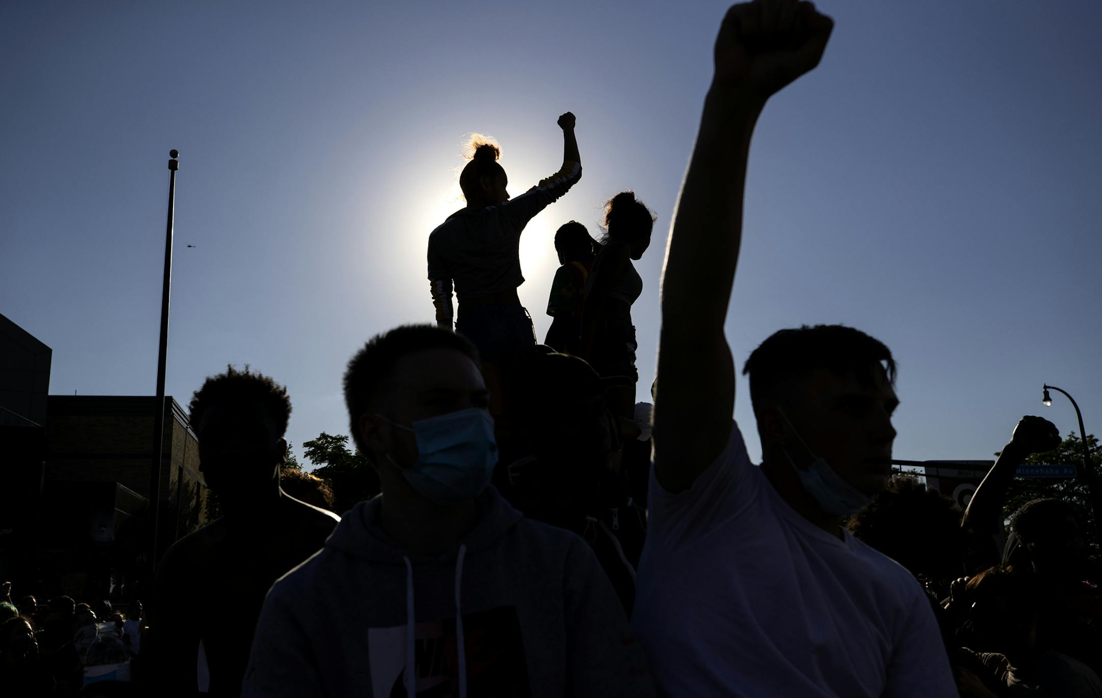 People gather to demand justice for George Floyd Thursday, May 28, 2020 in Minneapolis, Minn. Floyd, a handcuffed black man, died Monday in police custody near a convenience store. (Carlos Gonzalez/Star Tribune via AP)