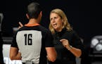 Minnesota Lynx head coach Cheryl Reeve talks to an official during the first half of Game 1 of a WNBA basketball semifinal round playoff series agains