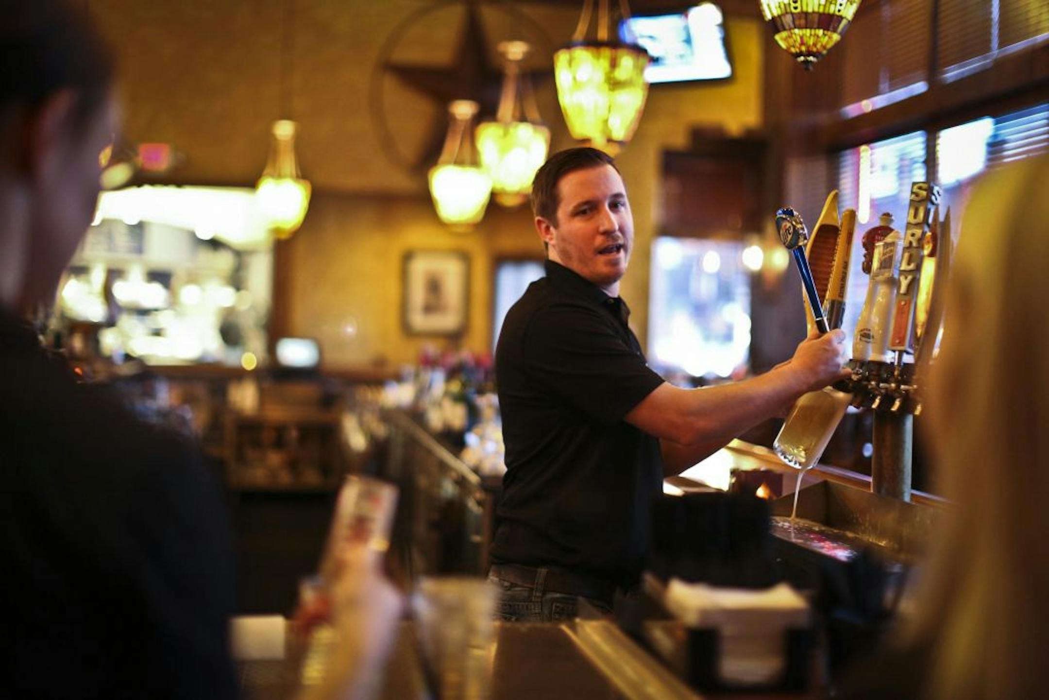 Mark Adams, a bartender at Axel's Bonfire in St. Paul, worried about the effect on bar and restaurant owners.