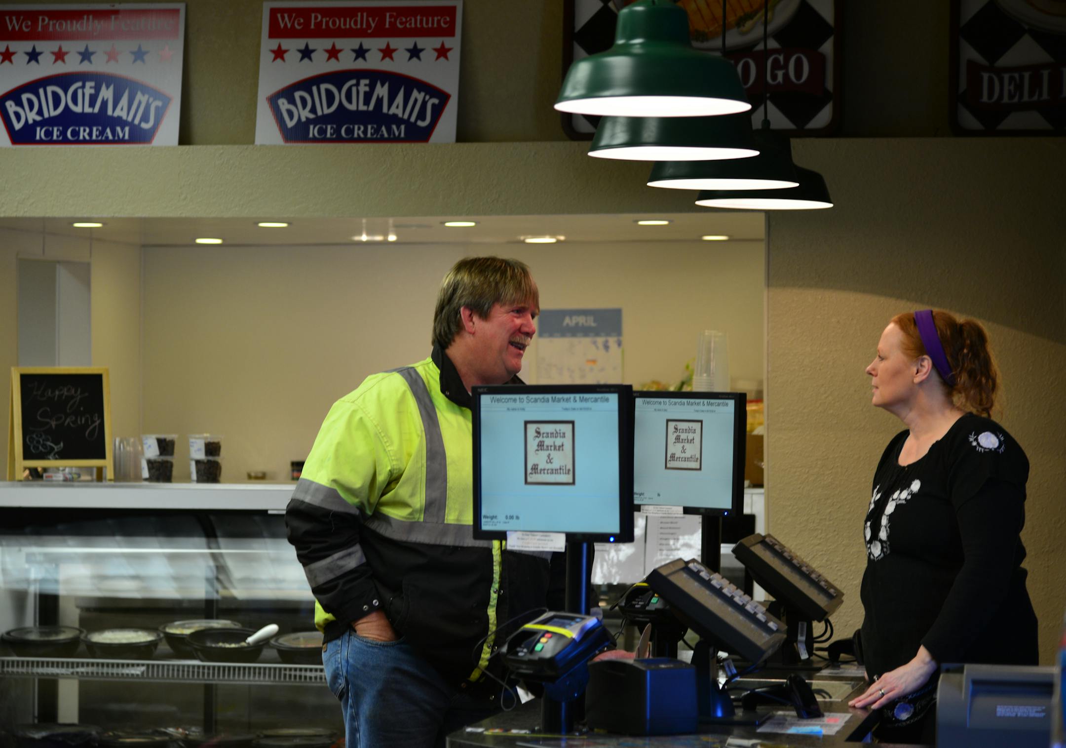Mom-and-pop operations like the Scandia Market & Mercantile , are less likely to recoup lost winter sales in the coming months. Holly Kaufhold talked with Adam Bruening of Stillwater at the register, he stopped in to see the completed store renovation .] Richard.Sennott@startribune.com Richard Sennott/Star Tribune Scandia Minn. Tuesday 4/15/2014) ** (cq)