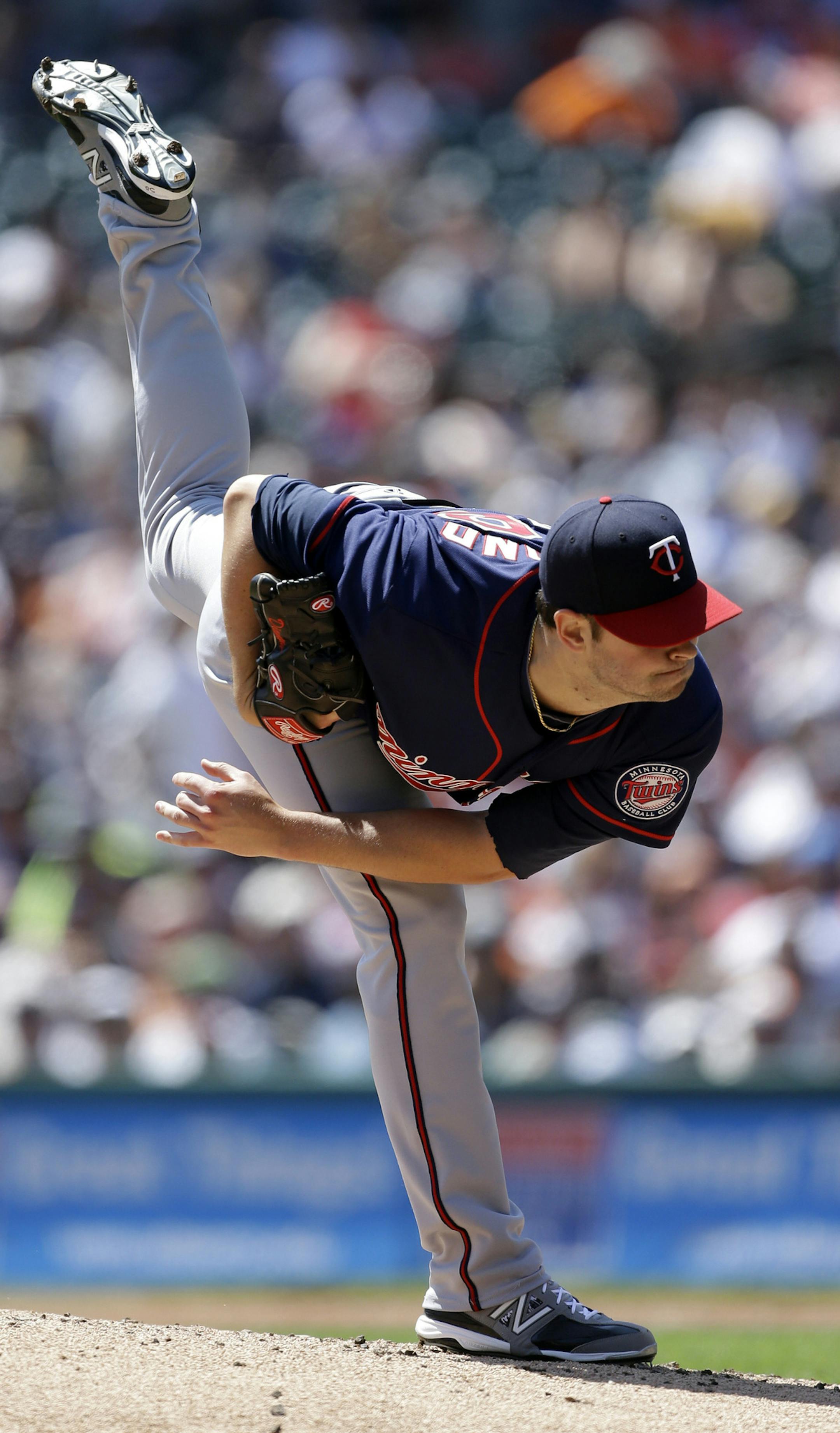 Minnesota Twins starting pitcher Scott follows through during the first inning of a baseball game against the Detroit Tigers in Detroit, Wednesday, May 1, 2013. (AP Photo/Carlos Osorio)