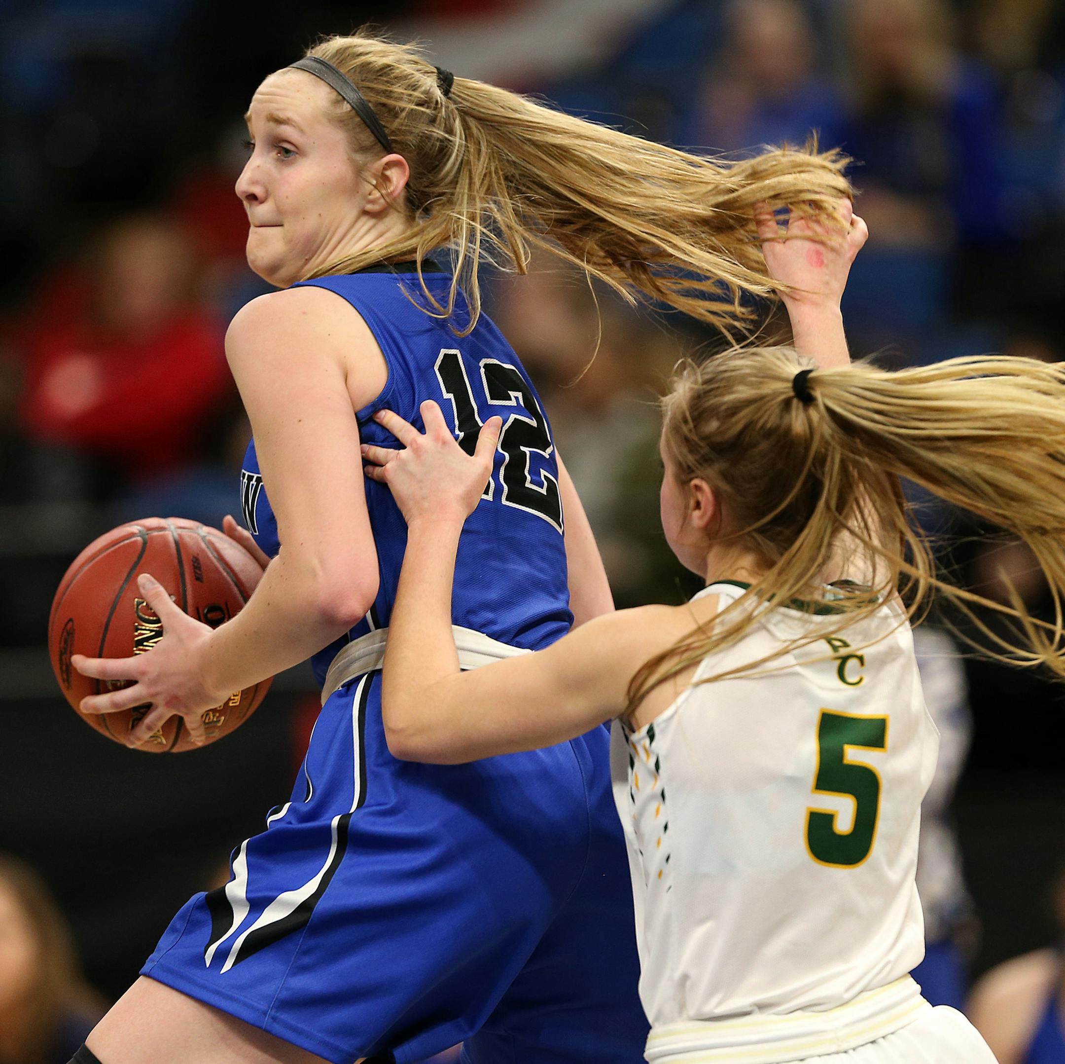 Eastview's Rachel Ranke (12) dribbled the ball around Park Center's Danielle Schaub (5) in the second half. ] ANTHONY SOUFFLE &#xef; anthony.souffle@startribune.com Players competed during the girls' basketball state tournament Class 4A quarterfinal games Tuesday, March 14, 2017 at the Target Center in Minneapolis.