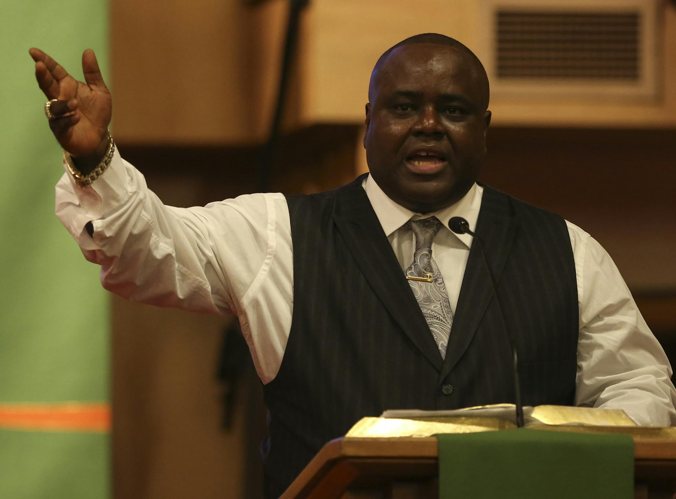 Before the vigil began, Pastor Harding Smith took time to address allegations that he or his church was gaining financially from his support of families in crisis Wednesday night at Elim Lutheran Church. ] JEFF WHEELER &#xef; jeff.wheeler@startribune.com Pastor Harding Smith led a vigil for the family of the three children killed in a fire last weekend. Community members and family gathered at Elim Lutheran Church in Robbinsdale Wednesday night, October 7, 2015. The church that Smith leads norma