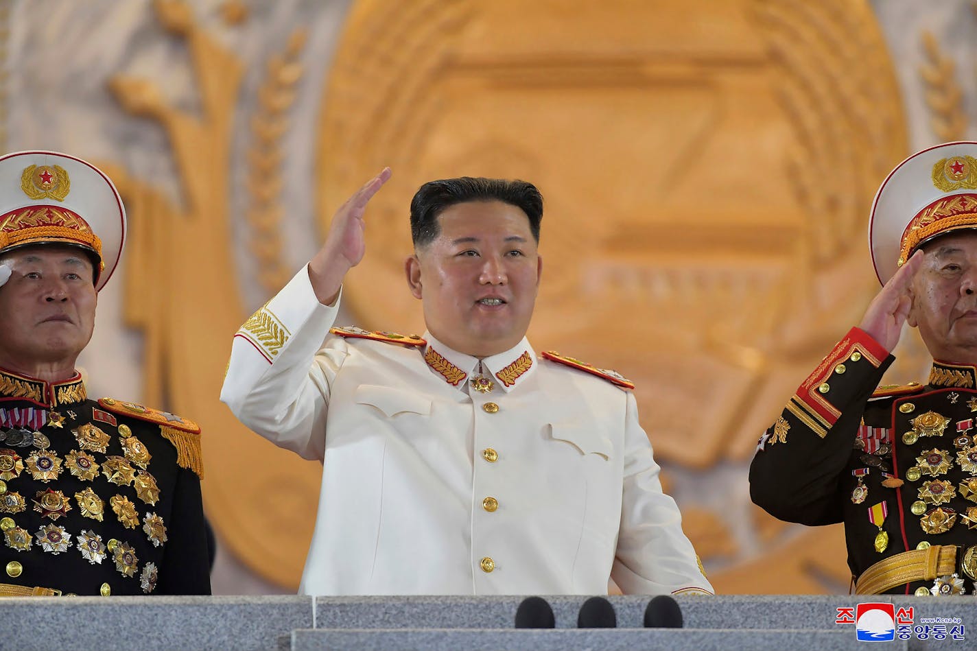 FILE - In this photo provided by the North Korean government, North Korean leader Kim Jong Un, center, watches a military parade to mark the 90th anniversary of North Korea's army at the Kim Il Sung Square in Pyongyang, North Korea, on April 25, 2022. South Korea's military said Sunday, June 5, that North Korea has test-fired at least one unidentified ballistic missile toward the sea, extending a provocative streak in weapons demonstrations this year that U.S. and South Korean officials say may culminate with a nuclear test explosion. (Korean Central News Agency/Korea News Service via AP, File)