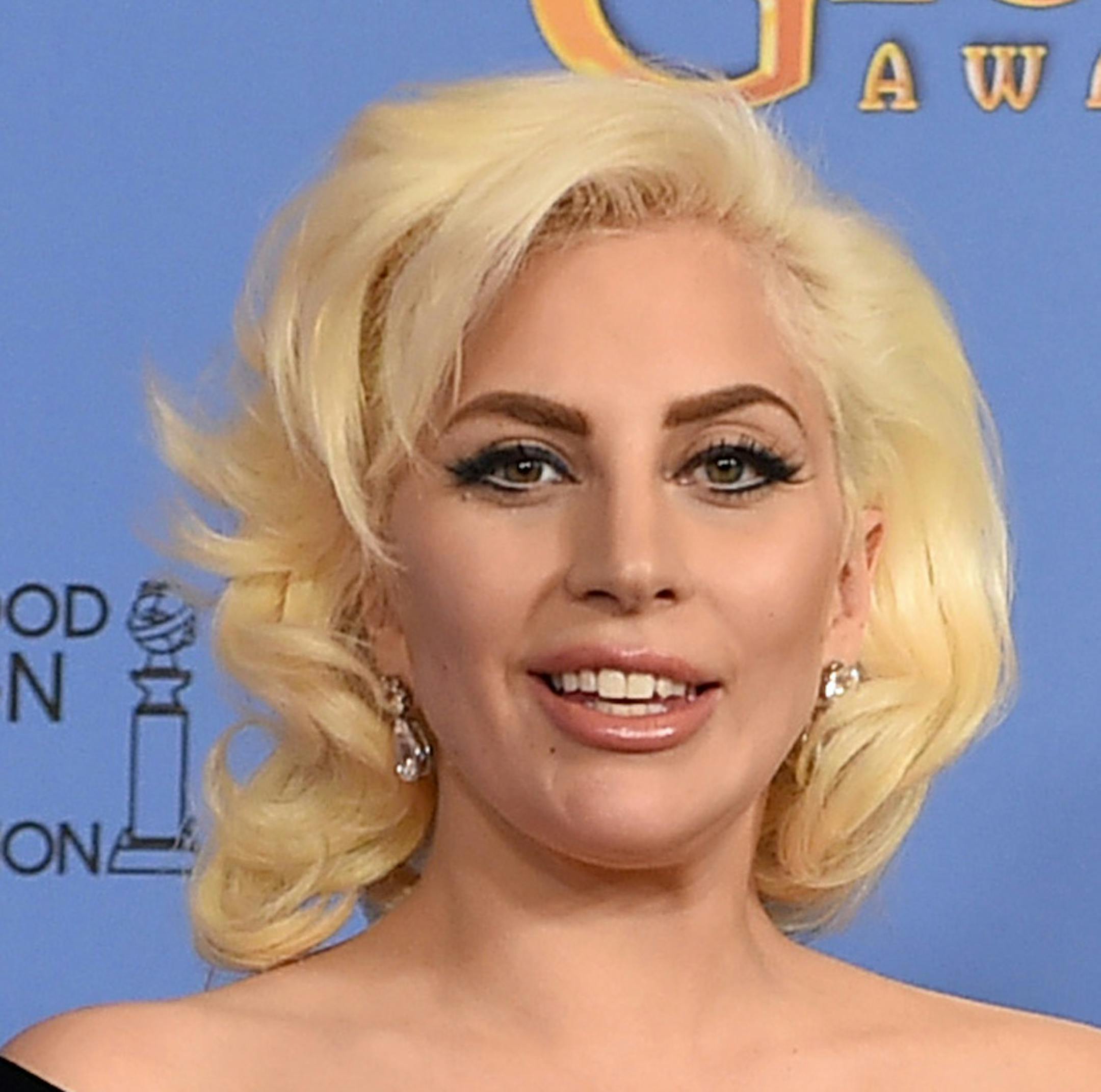Lady Gaga poses in the press room with the award for best performance by an actress in a limited series or a motion picture made for television for ìAmerican Horror Story: Hotelî at the 73rd annual Golden Globe Awards on Sunday, Jan. 10, 2016, at the Beverly Hilton Hotel in Beverly Hills, Calif. (Photo by Jordan Strauss/Invision/AP)