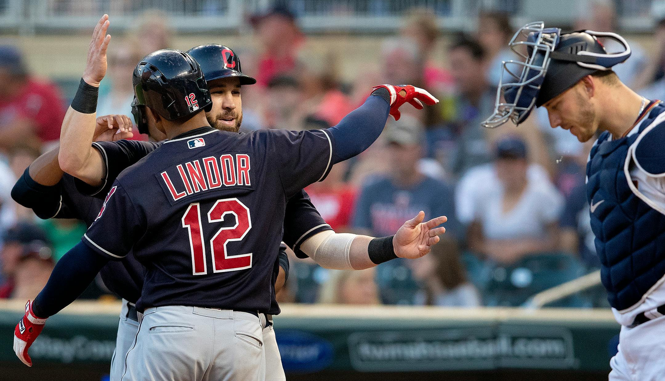 Francisco Lindor is congratulated by Jason Kipnis after hitting a three-run home run in the fourth inning against the Twins on Thursday