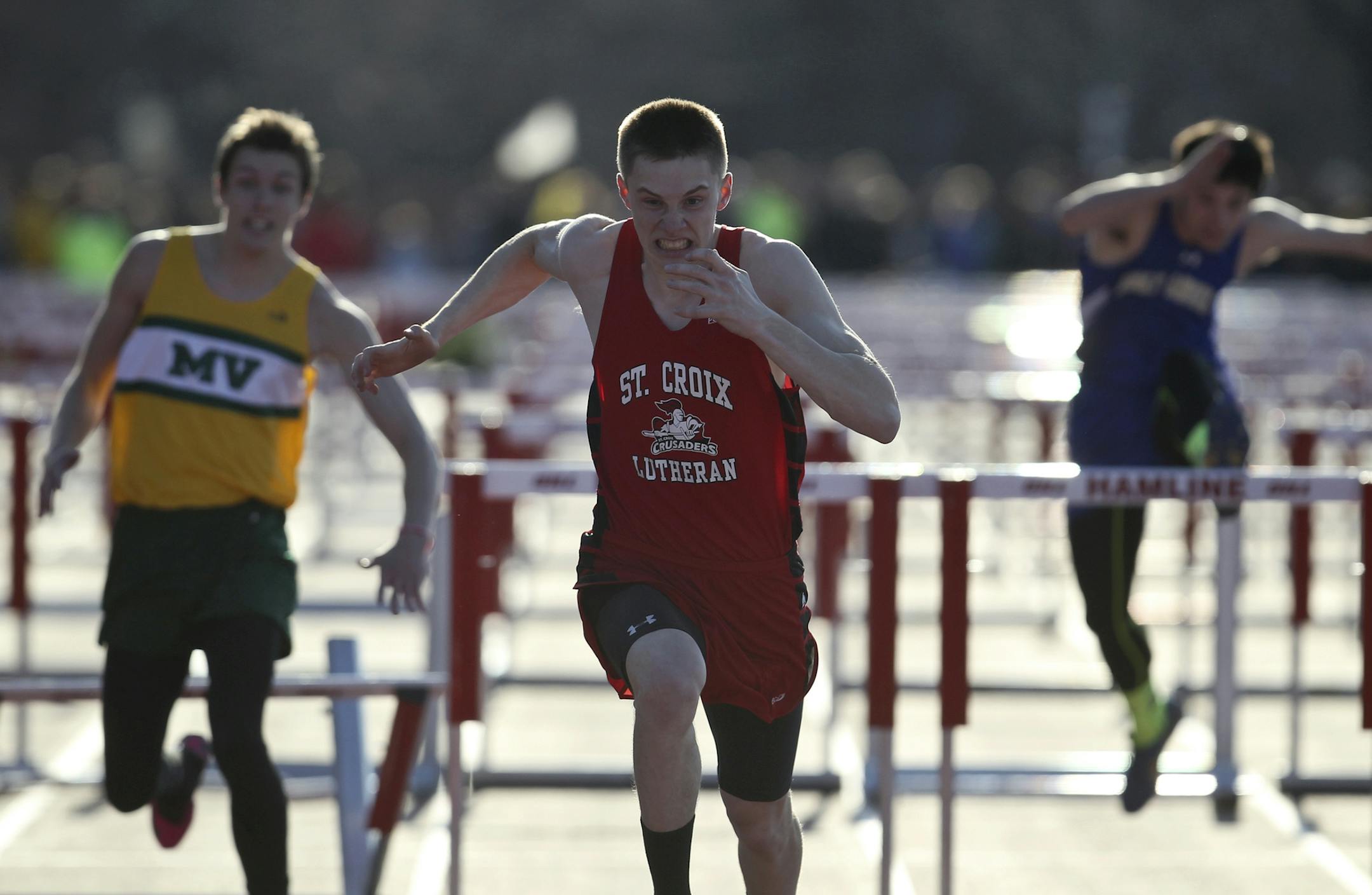 Jon Tollefson of St. Croix Lutheran smoked the competition in the boys 110 meter hurdles with a meet record of 14.42 during the Hamline Elite track meet Friday, April 25, 2014, at Hamline University in St. Paul, MN](DAVID JOLES/STARTRIBUNE) djoles@startribune.com Hamline Elite track meet**Jon Tollefson,cq