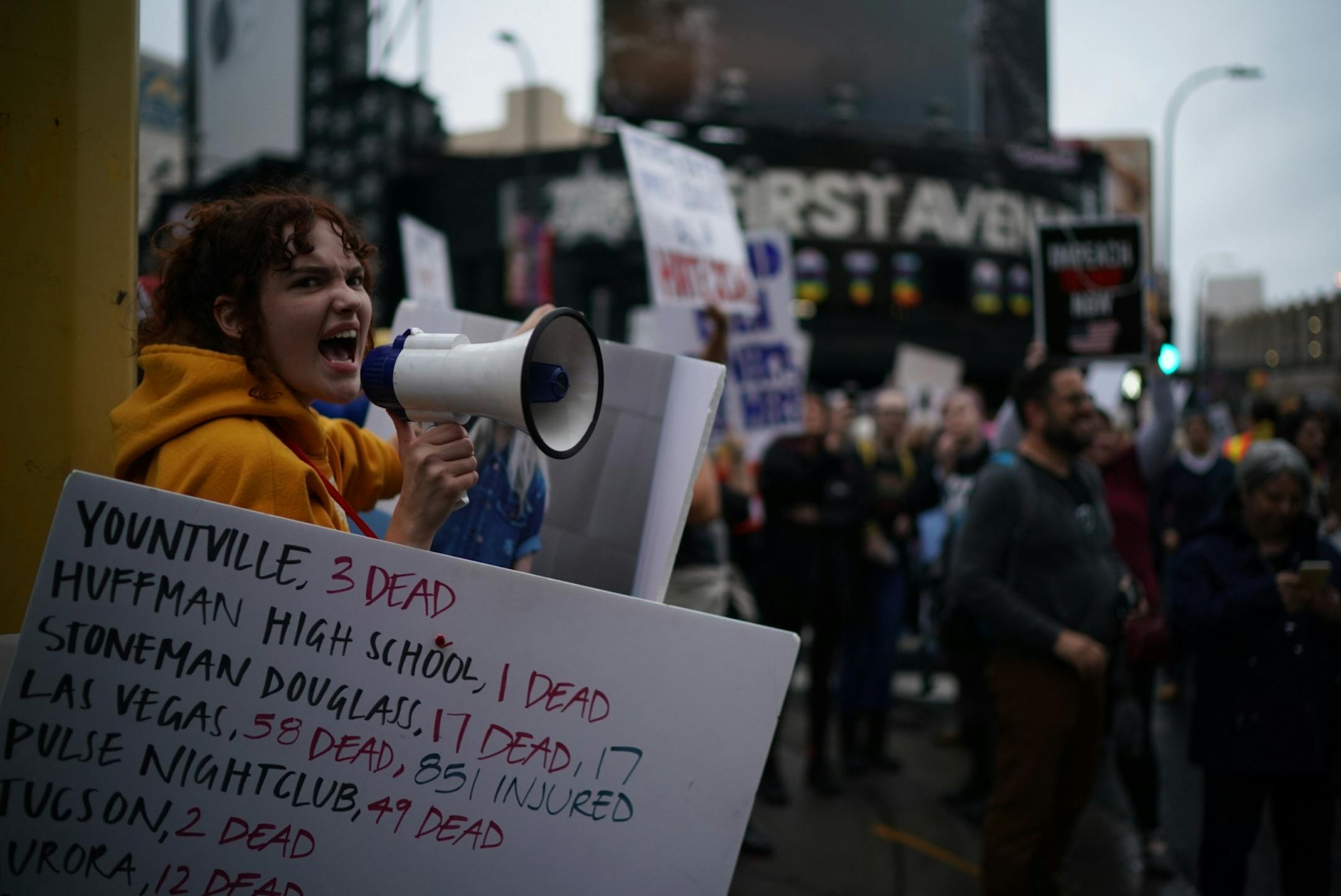 Supporters and protesters against President Trump interact outside Target Center.