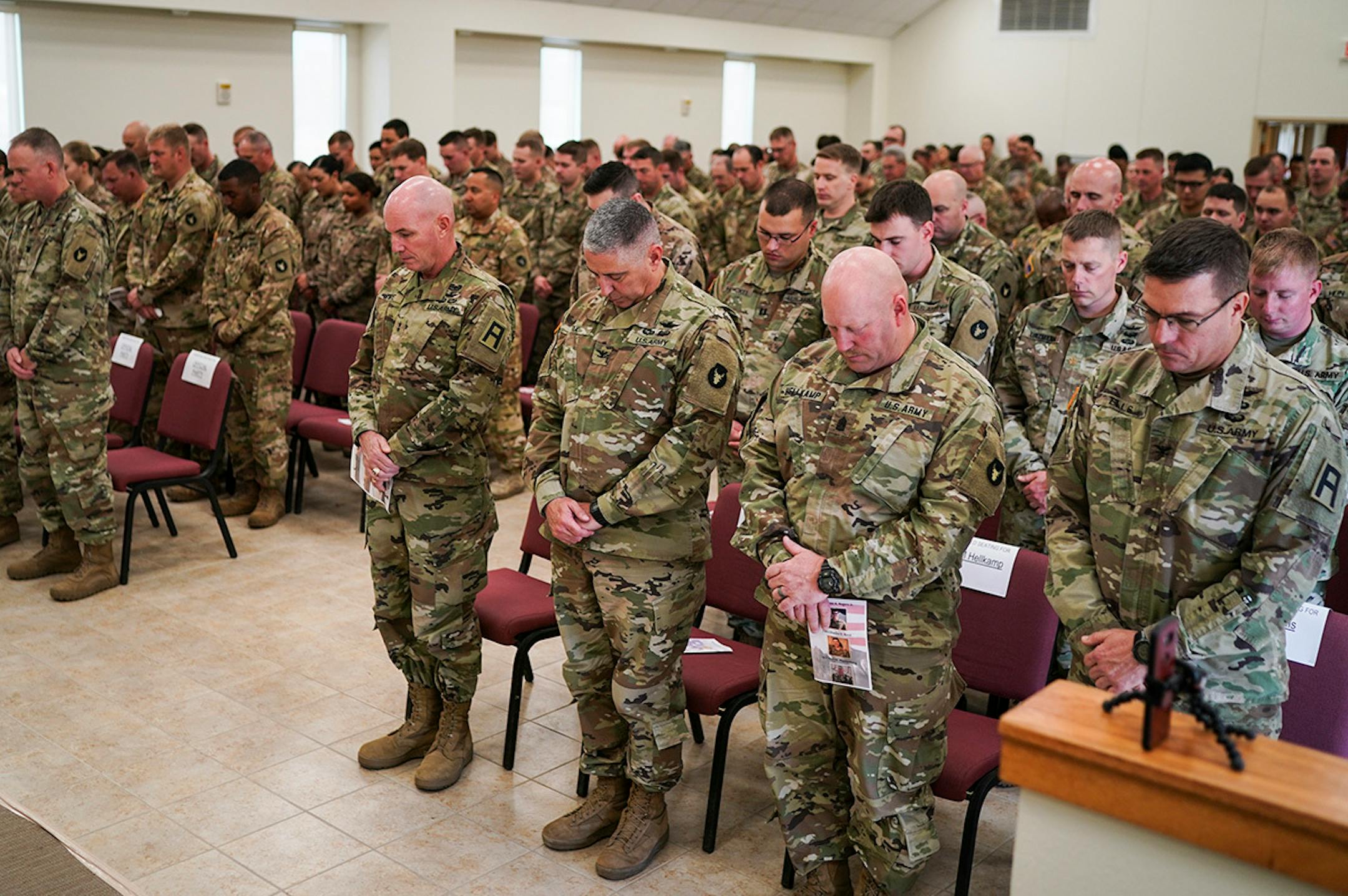 From left; Maj. Gen. Tate, Col. Greg Fix, Command Sgt. Maj. Mitch Hellkamp and Col. Ronald Ells stood for invocation during a memorial ceremony in North Fort Hood, Texas.