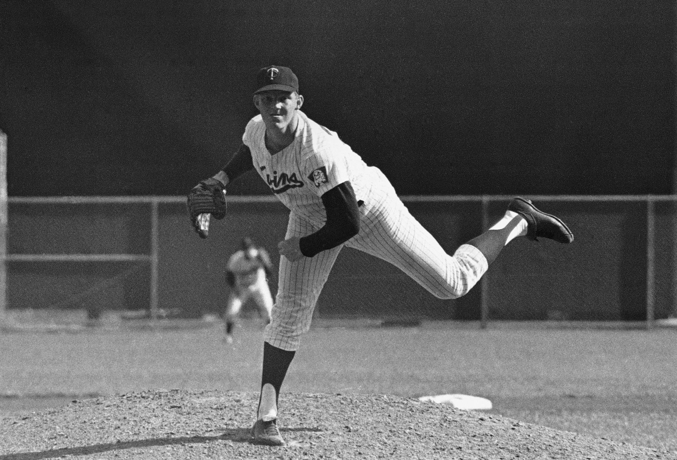 Minnesota Twins' pitcher big Jim Kaat watches the ball as he throws the Twins to a 1-0 shutout win over the Detroit Tigers during the American League game in St. Paul, Sept. 26, 1966. The victory gave Kaat his 25th winoff the season, more than all other American League pitchers. (AP Photo/Robert Walsh) ORG XMIT: APHS106449 ORG XMIT: MIN1507102022090007