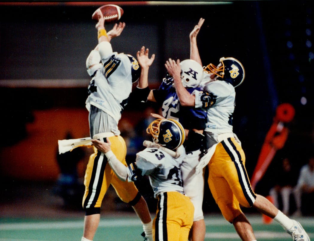 Three Totino-Grace defenders stopped Albany’s Erik Wimmer once, but he got away often in the 1989 Class A title game.