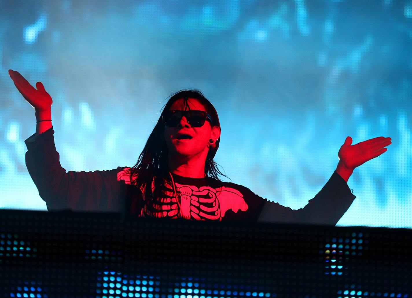 Skrillex performs at the Voodoo Experience on Sunday, Oct. 28, 2012, in New Orleanse. (Photo by Barry Brecheisen/Invision/AP) ORG XMIT: INVW ORG XMIT: MIN1311011237055728