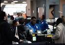 A Transportation Security Administration (TSA) agent works at a check-point at LaGuardia Airport in New York on Jan. 25, 2019. MUST CREDIT: Bloomberg 