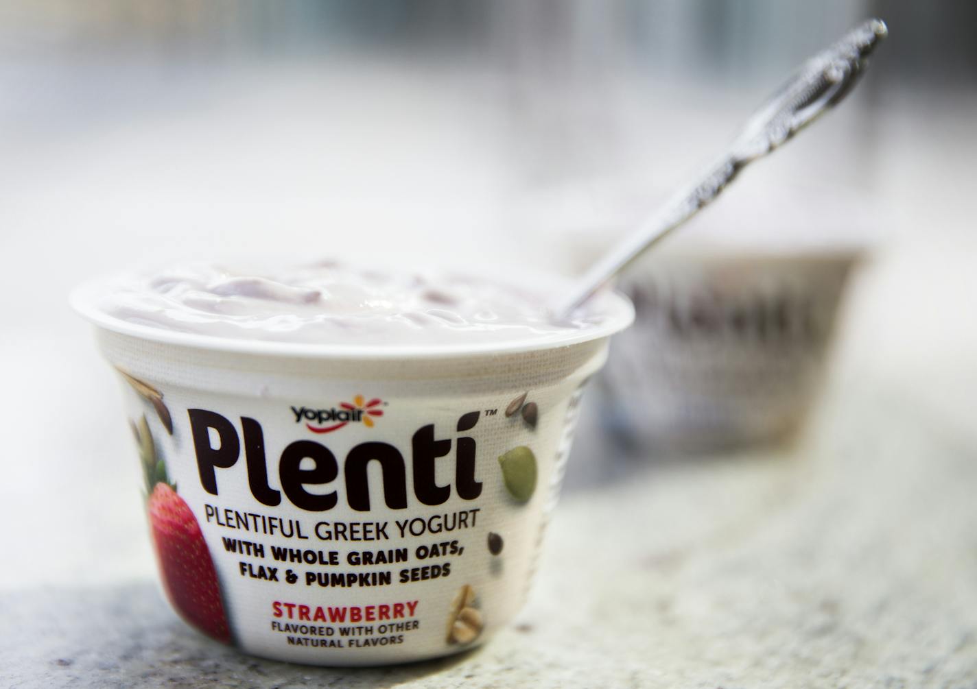 A new product from Yoplait called Plenti, a Greek yogurt with oats, nuts and seeds blended in at General Mills headquarters in Golden Valley on Thursday, March 12, 2015. ] LEILA NAVIDI leila.navidi@startribune.com /